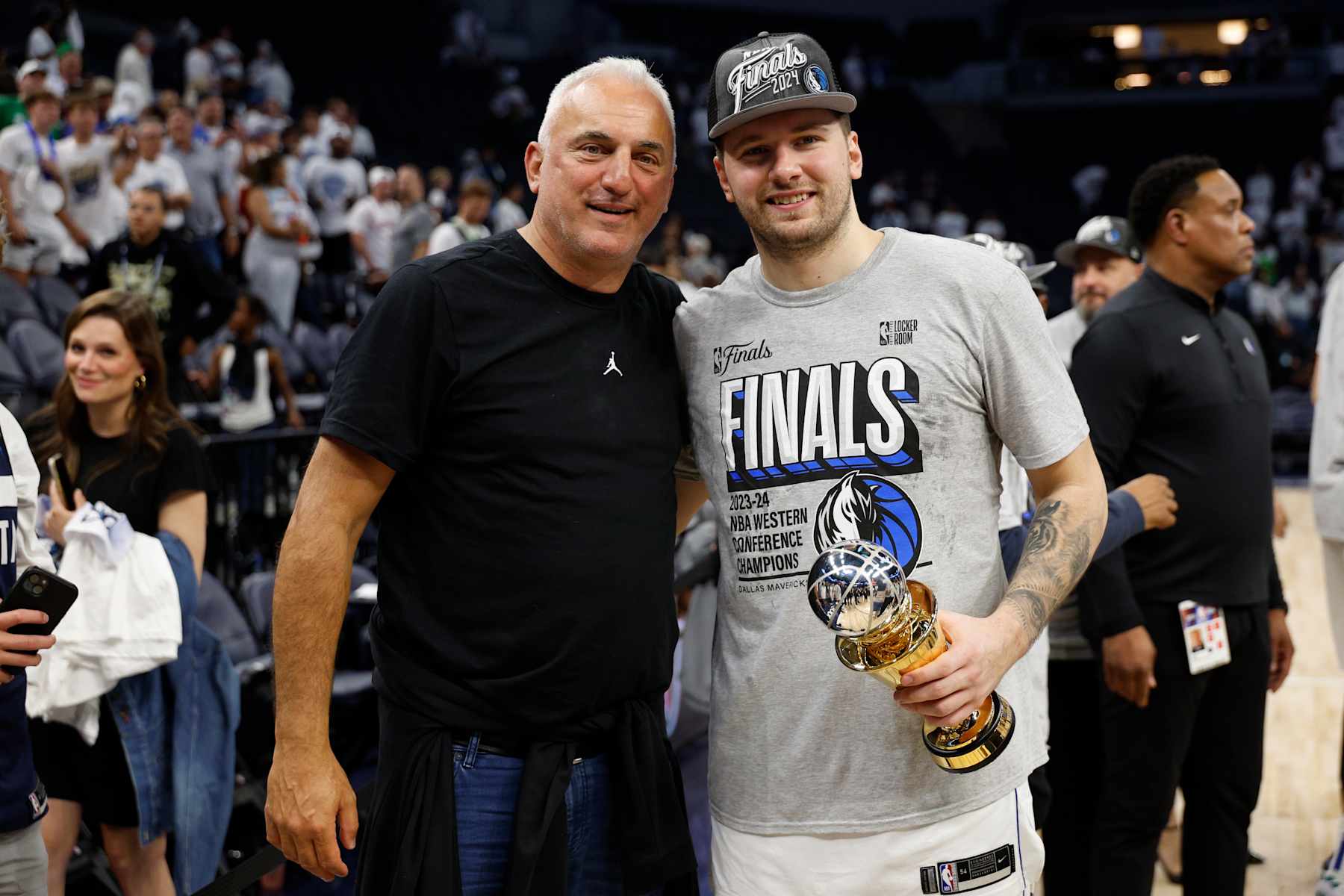MINNEAPOLIS, MINNESOTA - MAY 30: Luka Doncic #77 of the Dallas Mavericks celebrates with is father Sasa after a 124-103 victory against the Minnesota Timberwolves in Game Five of the Western Conference Finals at Target Center on May 30, 2024 in Minneapolis, Minnesota. NOTE TO USER: User expressly acknowledges and agrees that, by downloading and or using this photograph, User is consenting to the terms and conditions of the Getty Images License Agreement. (Photo by David Berding/Getty Images)