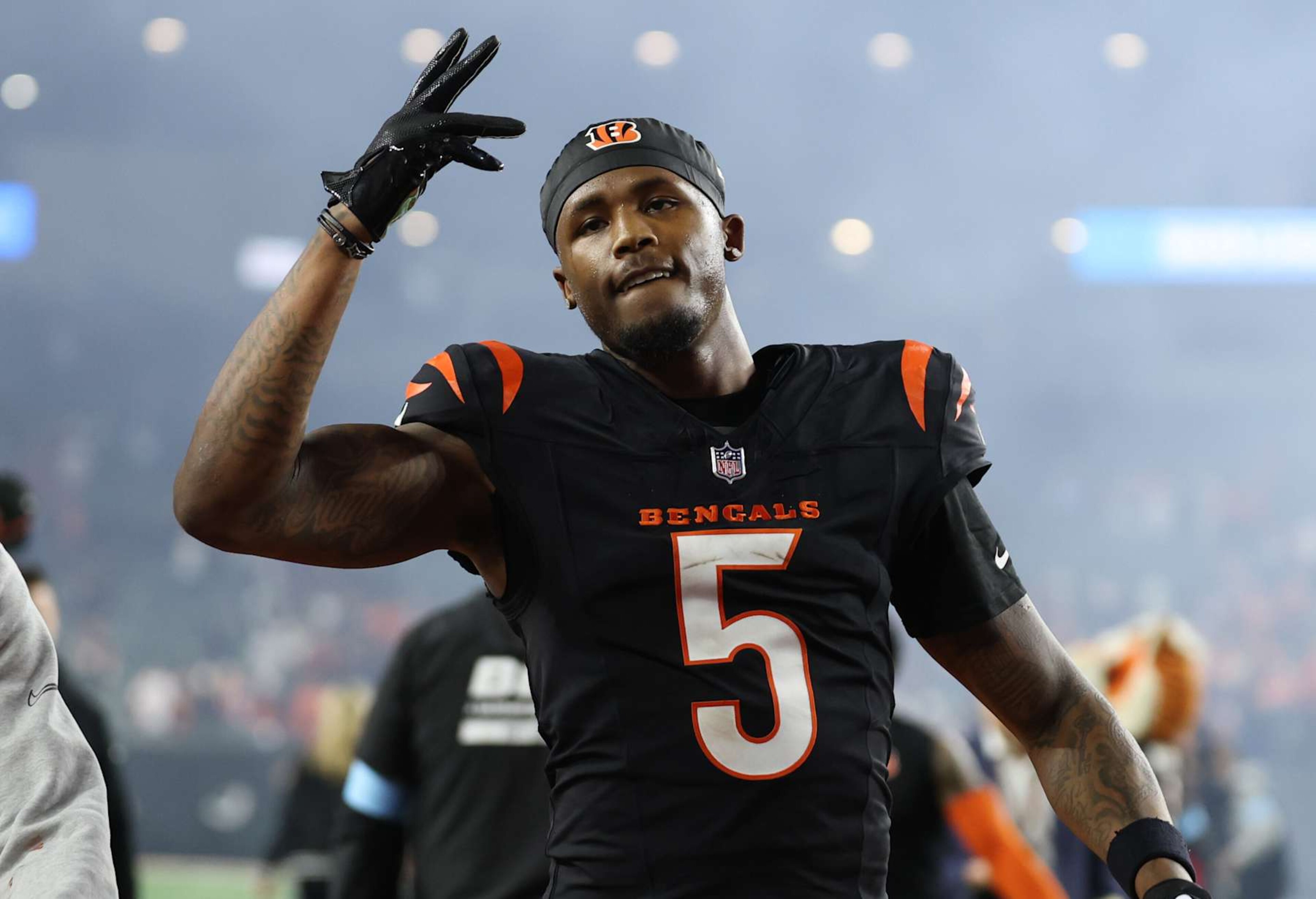 CINCINNATI, OHIO - DECEMBER 28: Tee Higgins #5 of the Cincinnati Bengals reacts after a 30-24 overtime victory against the Denver Broncos at Paycor Stadium on December 28, 2024 in Cincinnati, Ohio. (Photo by Andy Lyons/Getty Images) CINCINNATI, OHIO - DECEMBER 28: Tee Higgins #5 of the Cincinnati Bengals reacts after a 30-24 overtime victory against the Denver Broncos at Paycor Stadium on December 28, 2024 in Cincinnati, Ohio. (Photo by Andy Lyons/Getty Images)
