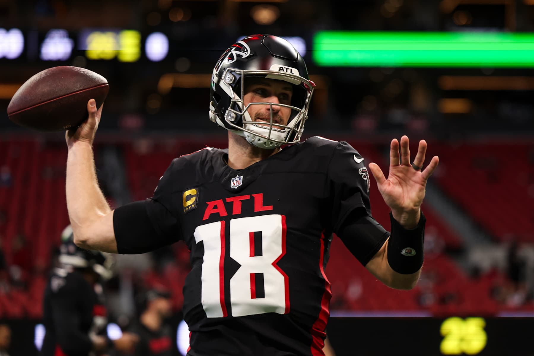 ATLANTA, GEORGIA - JANUARY 05: Kirk Cousins #18 of the Atlanta Falcons warms up prior to an NFL football game against the Carolina Panthers at Mercedes-Benz Stadium on January 5, 2025 in Atlanta, Georgia. (Photo by Perry Knotts/Getty Images)