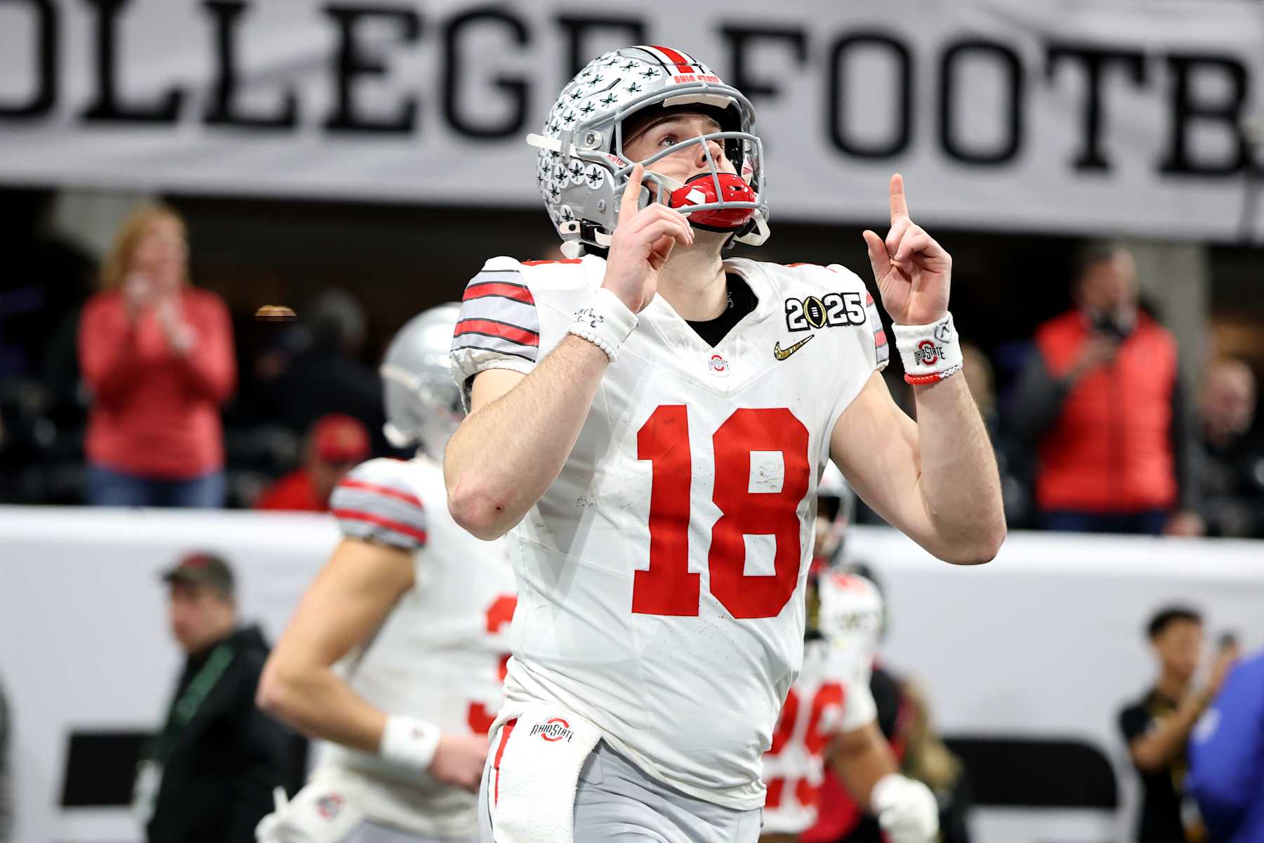 ATLANTA, GEORGIA - JANUARY 20: Will Howard #18 of the Ohio State Buckeyes  takes the field against the Notre Dame Fighting Irish during the 2025 College Football Playoff National Championship held at Mercedes-Benz Stadium on January 20, 2025 in Atlanta, Georgia. (Photo by Jamie Schwaberow/Getty Images)