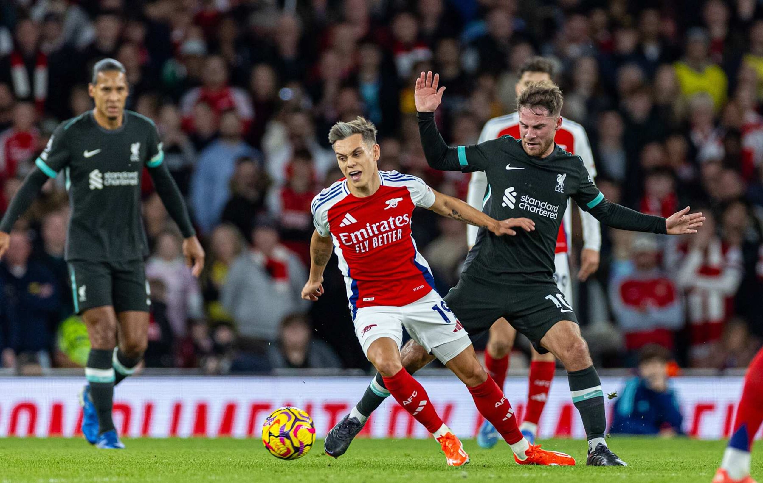 Arsenal's Leandro Trossard 2nd L is challenged by Liverpool's Alexis Mac Allister during the English Premier League football match between Arsenal and Liverpool in London, Britain, on Oct. 27, 2024. Xinhua FOR EDITORIAL USE ONLY. NOT FOR SALE FOR MARKETING OR ADVERTISING CAMPAIGNS. NO USE WITH UNAUTHORIZED AUDIO, VIDEO, DATA, FIXTURE LISTS, CLUB/LEAGUE LOGOS OR "LIVE" SERVICES. ONLINE IN-MATCH USE LIMITED TO 45 IMAGES, NO VIDEO EMULATION. NO USE IN BETTING, GAMES OR SINGLE CLUB/LEAGUE/PLAYER PUBLICATIONS. (Photo by Xinhua via Getty Images)