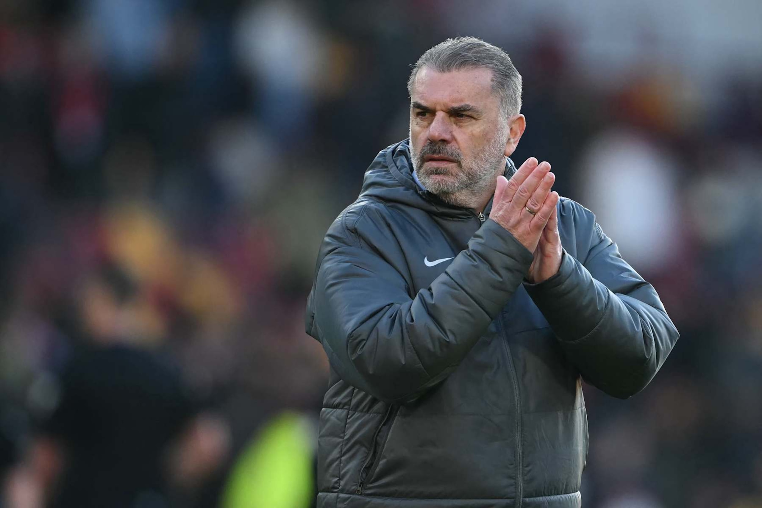 Tottenham Hotspur's Greek-Australian Head Coach Ange Postecoglou applauds fans on the pitch after the English Premier League football match between Brentford and Tottenham Hotspur at the Gtech Community Stadium in London on February 2, 2025. Spurs won the game 2-0. (Photo by JUSTIN TALLIS / AFP) / RESTRICTED TO EDITORIAL USE. No use with unauthorized audio, video, data, fixture lists, club/league logos or 'live' services. Online in-match use limited to 120 images. An additional 40 images may be used in extra time. No video emulation. Social media in-match use limited to 120 images. An additional 40 images may be used in extra time. No use in betting publications, games or single club/league/player publications. /  (Photo by JUSTIN TALLIS/AFP via Getty Images)          