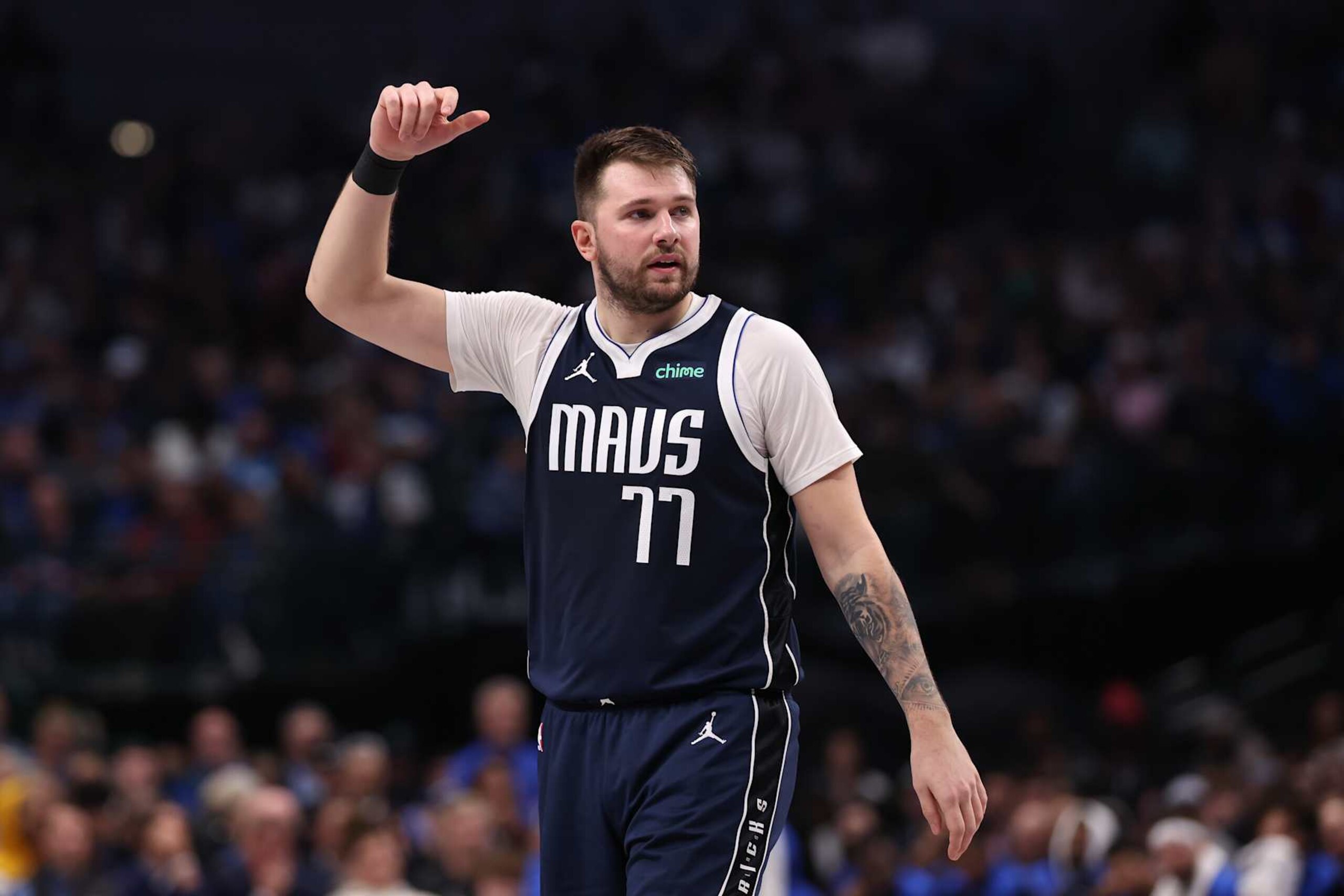 DALLAS, TEXAS - DECEMBER 23: Luka Doncic #77 of the Dallas Mavericks looks on during the first half against the Portland Trail Blazers at American Airlines Center on December 23, 2024 in Dallas, Texas. NOTE TO USER: User expressly acknowledges and agrees that, by downloading and/or using this photograph, user is consenting to the terms and conditions of the Getty Images License Agreement. (Photo by Sam Hodde/Getty Images)