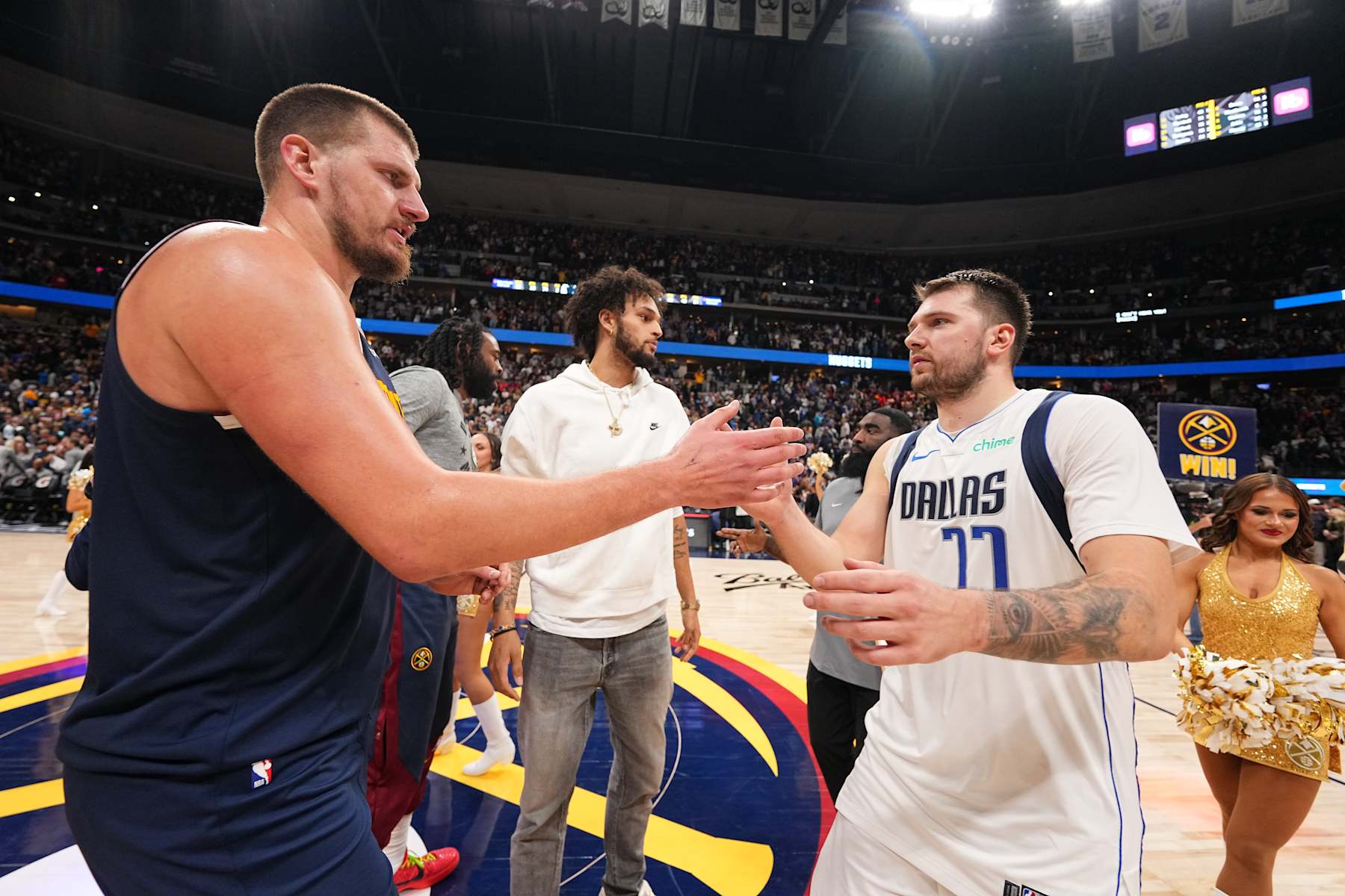 DENVER, CO - NOVEMBER 10:  Nikola Jokic #15 of the Denver Nuggets and Luka Doncic #77 of the Dallas Mavericks after the game during a regular season game on November 10, 2024 at Ball Arena in Denver, Colorado. NOTE TO USER: User expressly acknowledges and agrees that, by downloading and/or using this Photograph, user is consenting to the terms and conditions of the Getty Images License Agreement. Mandatory Copyright Notice: Copyright 2024 NBAE (Photo by Bart Young/NBAE via Getty Images)