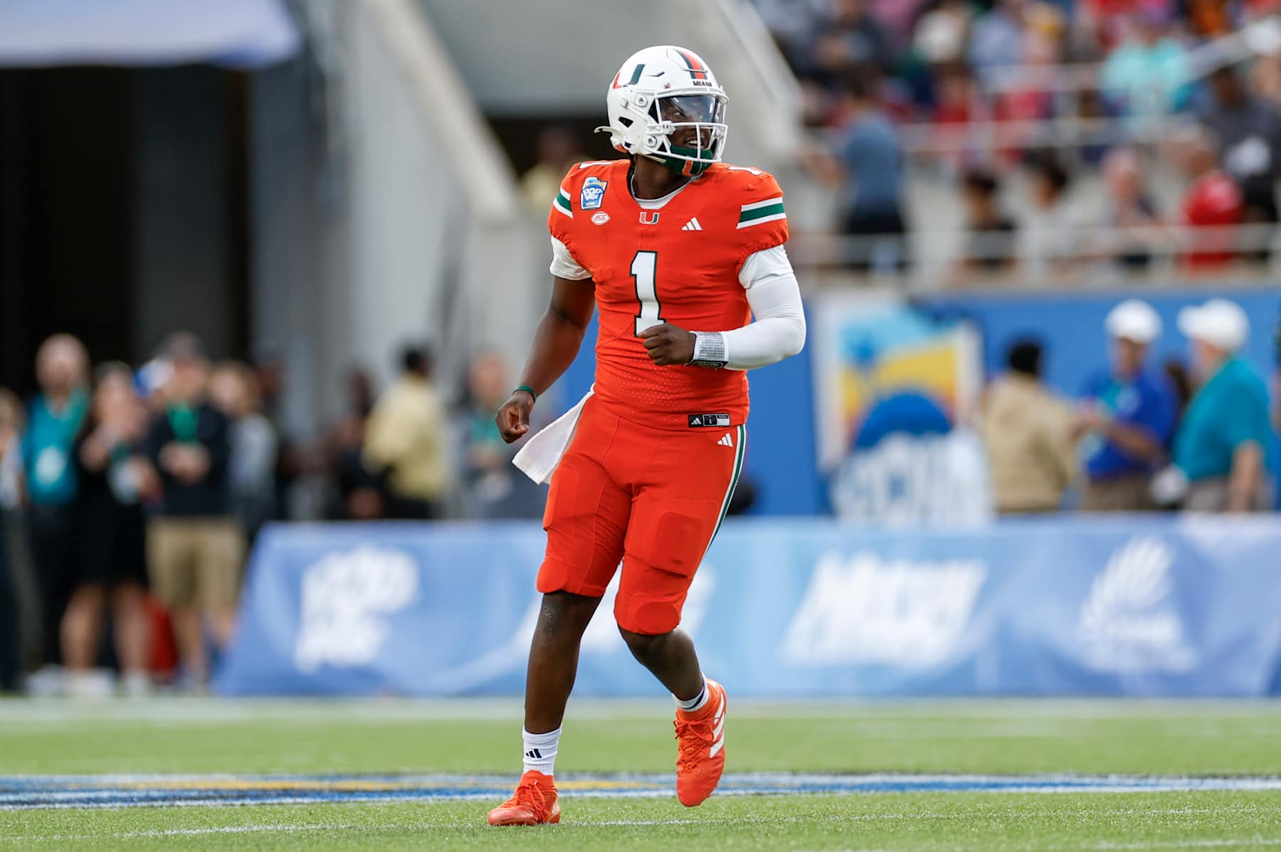 ORLANDO, FL - DECEMBER 28: Miami Hurricanes quarterback Cam Ward (1) reacts after throwing a touchdown pass during the game during the game between the Miami Hurricanes and the Iowa State Cyclones on December 28, 2024 at Camping World Stadium in Orlando, Fl. (Photo by David Rosenblum/Icon Sportswire via Getty Images)