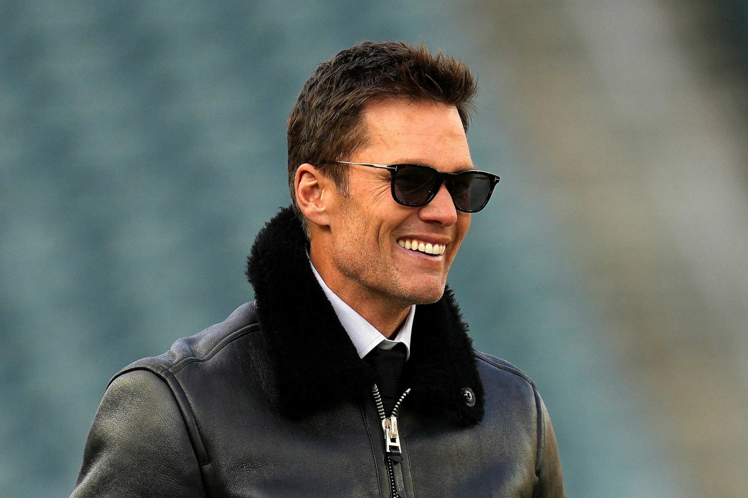 PHILADELPHIA, PENNSYLVANIA - JANUARY 12: Former NFL Player Tom Brady looks on prior to the NFC Wild Card Playoff between the Green Bay Packers and the Philadelphia Eagles at Lincoln Financial Field on January 12, 2025 in Philadelphia, Pennsylvania.  (Photo by Mitchell Leff/Getty Images)