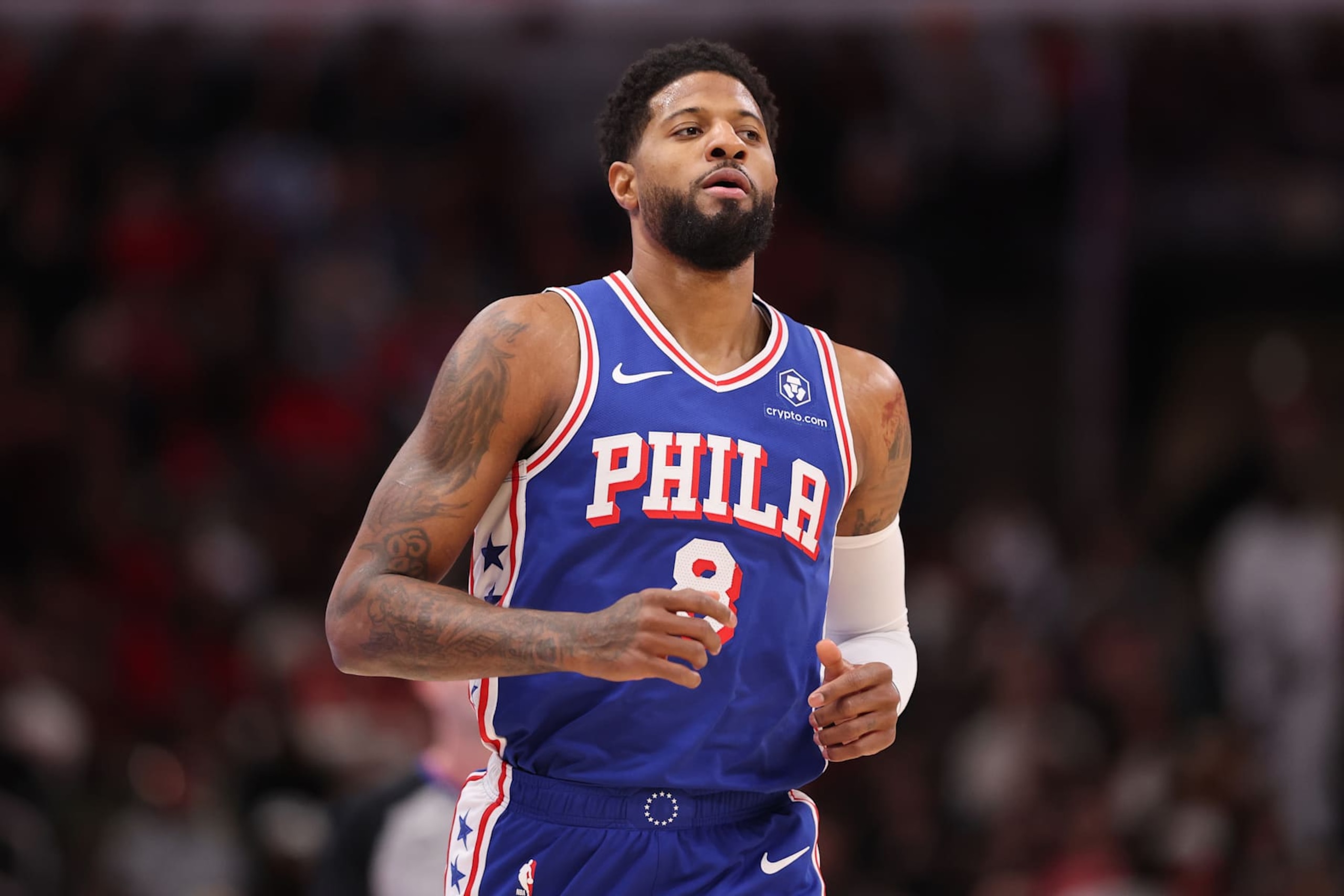 CHICAGO, ILLINOIS - JANUARY 25: Paul George #8 of the Philadelphia 76ers looks on against the Chicago Bulls during the first half at the United Center on January 25, 2025 in Chicago, Illinois. NOTE TO USER: User expressly acknowledges and agrees that, by downloading and or using this photograph, User is consenting to the terms and conditions of the Getty Images License Agreement.  (Photo by Michael Reaves/Getty Images)