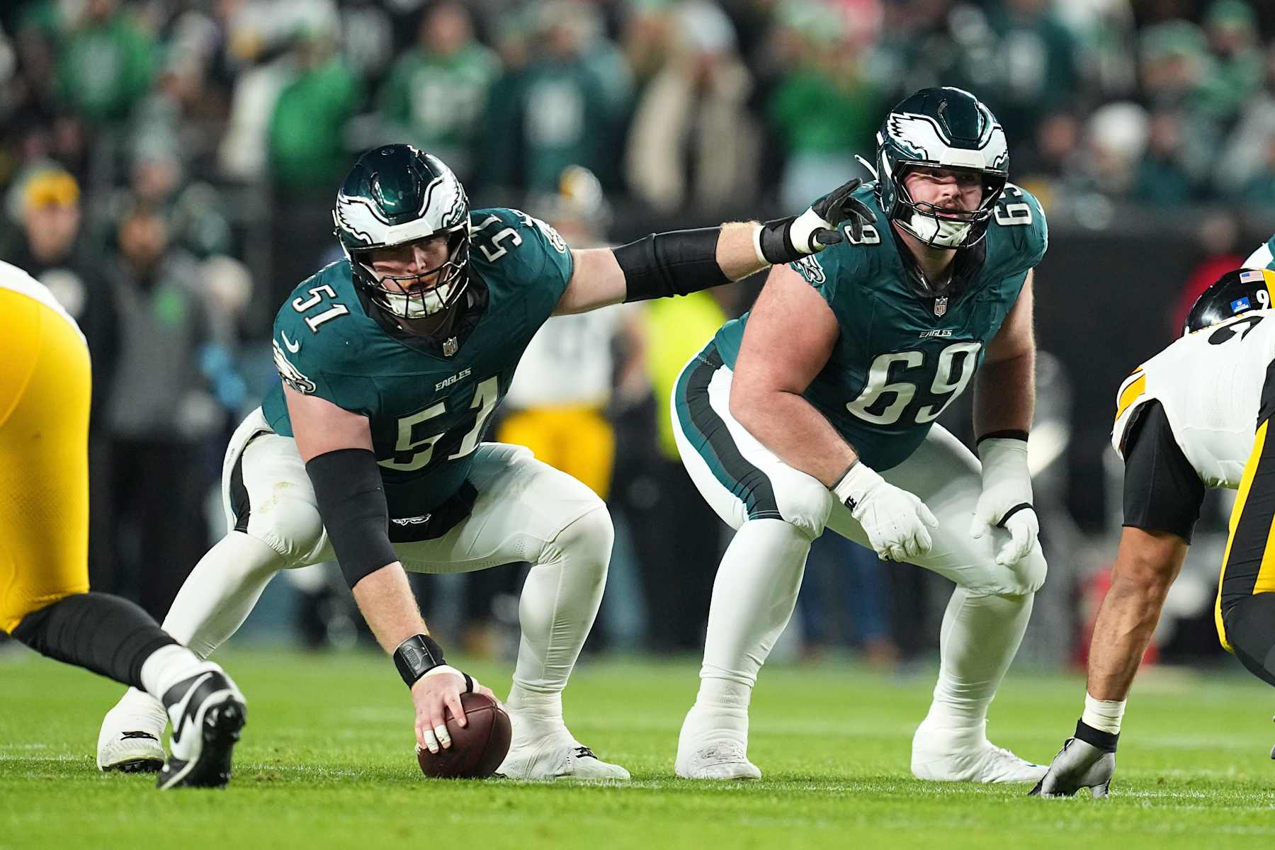 Eagles center Cam Jurgens (left) and guard Landon Dickerson (right)