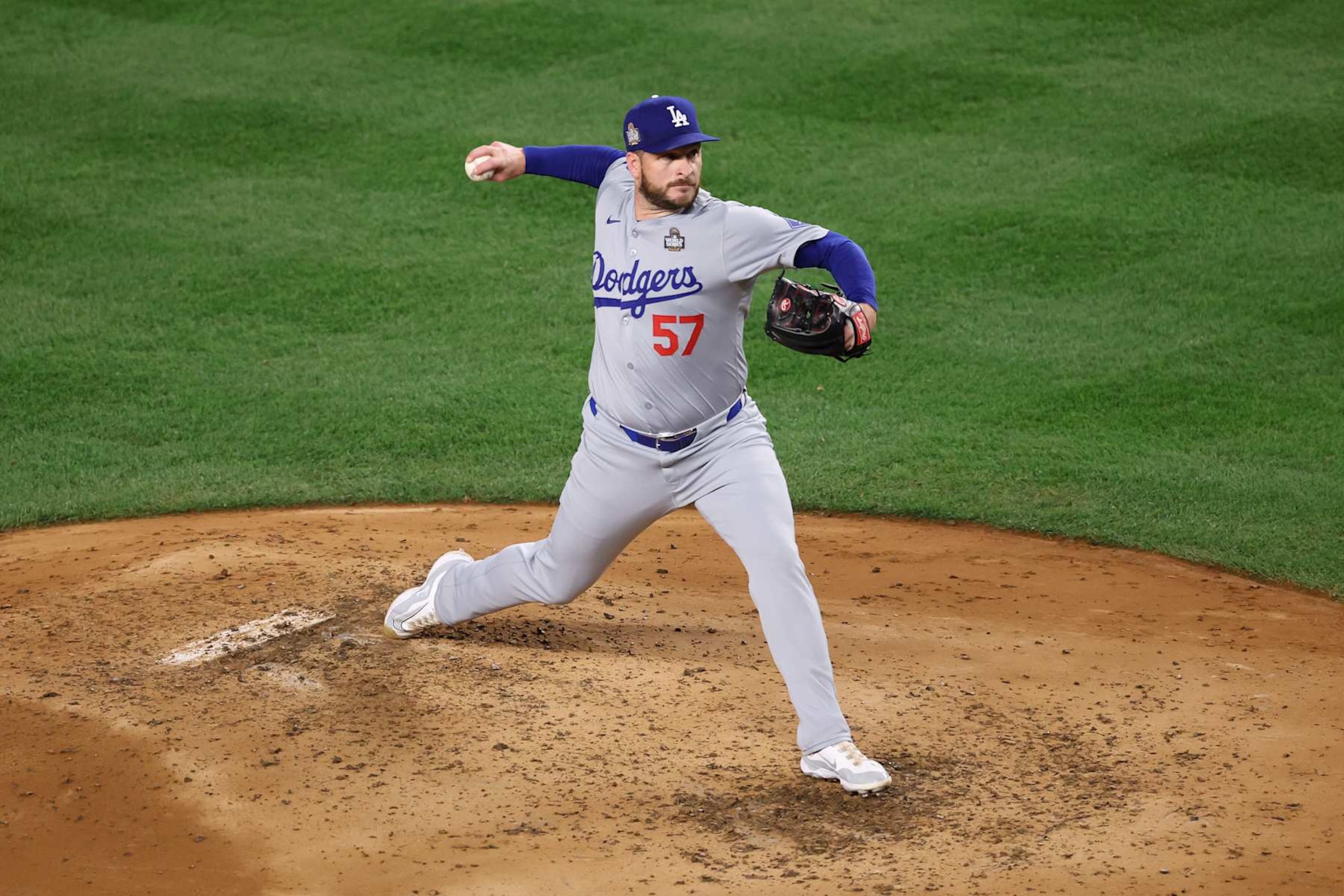 NEW YORK, NEW YORK - OCTOBER 30: Ryan Brasier #57 of the Los Angeles Dodgers pitches during the third inning of Game Five of the 2024 World Series against the New York Yankees at Yankee Stadium on October 30, 2024 in the Bronx borough of New York City. (Photo by Luke Hales/Getty Images) NEW YORK, NEW YORK - OCTOBER 30: Ryan Brasier #57 of the Los Angeles Dodgers pitches during the third inning of Game Five of the 2024 World Series against the New York Yankees at Yankee Stadium on October 30, 2024 in the Bronx borough of New York City. (Photo by Luke Hales/Getty Images)