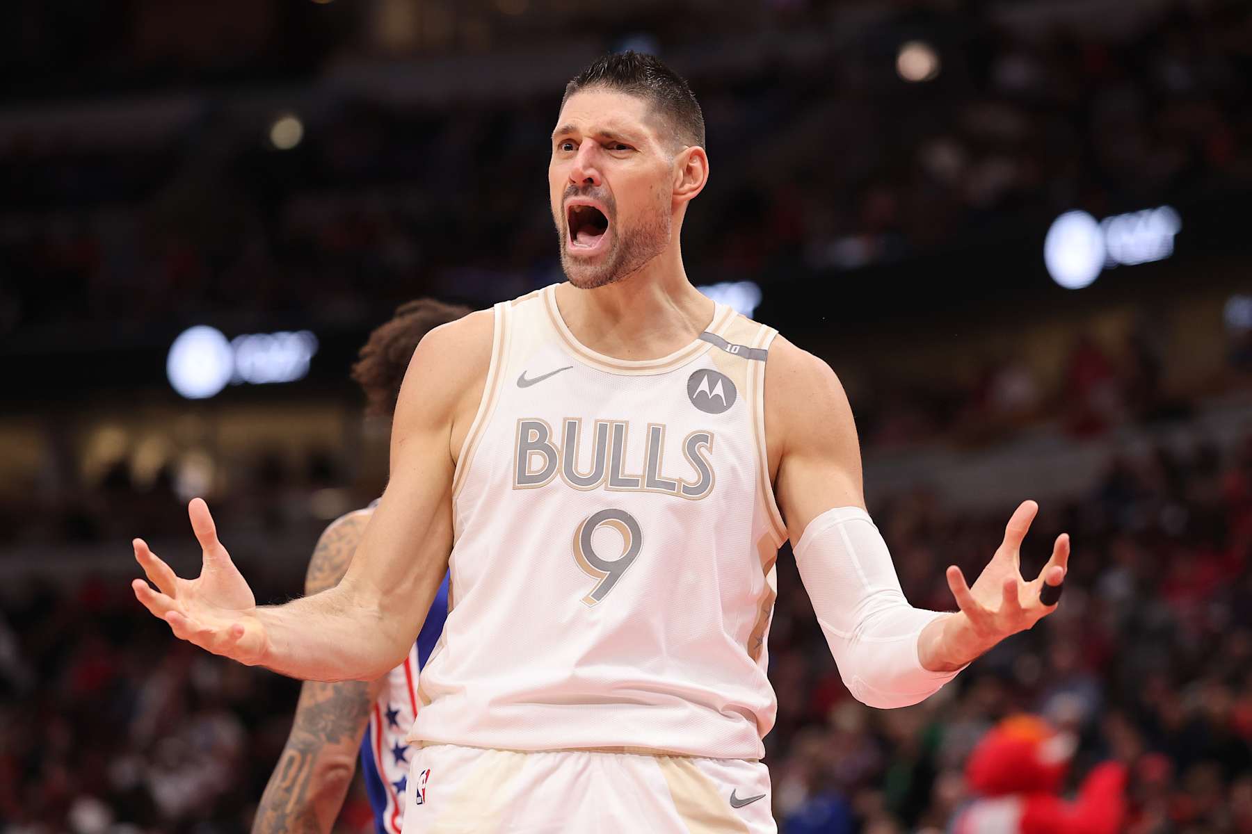 CHICAGO, ILLINOIS - JANUARY 25: Nikola Vucevic #9 of the Chicago Bulls reacts against the Philadelphia 76ers during the first half at the United Center on January 25, 2025 in Chicago, Illinois. NOTE TO USER: User expressly acknowledges and agrees that, by downloading and or using this photograph, User is consenting to the terms and conditions of the Getty Images License Agreement.  (Photo by Michael Reaves/Getty Images)