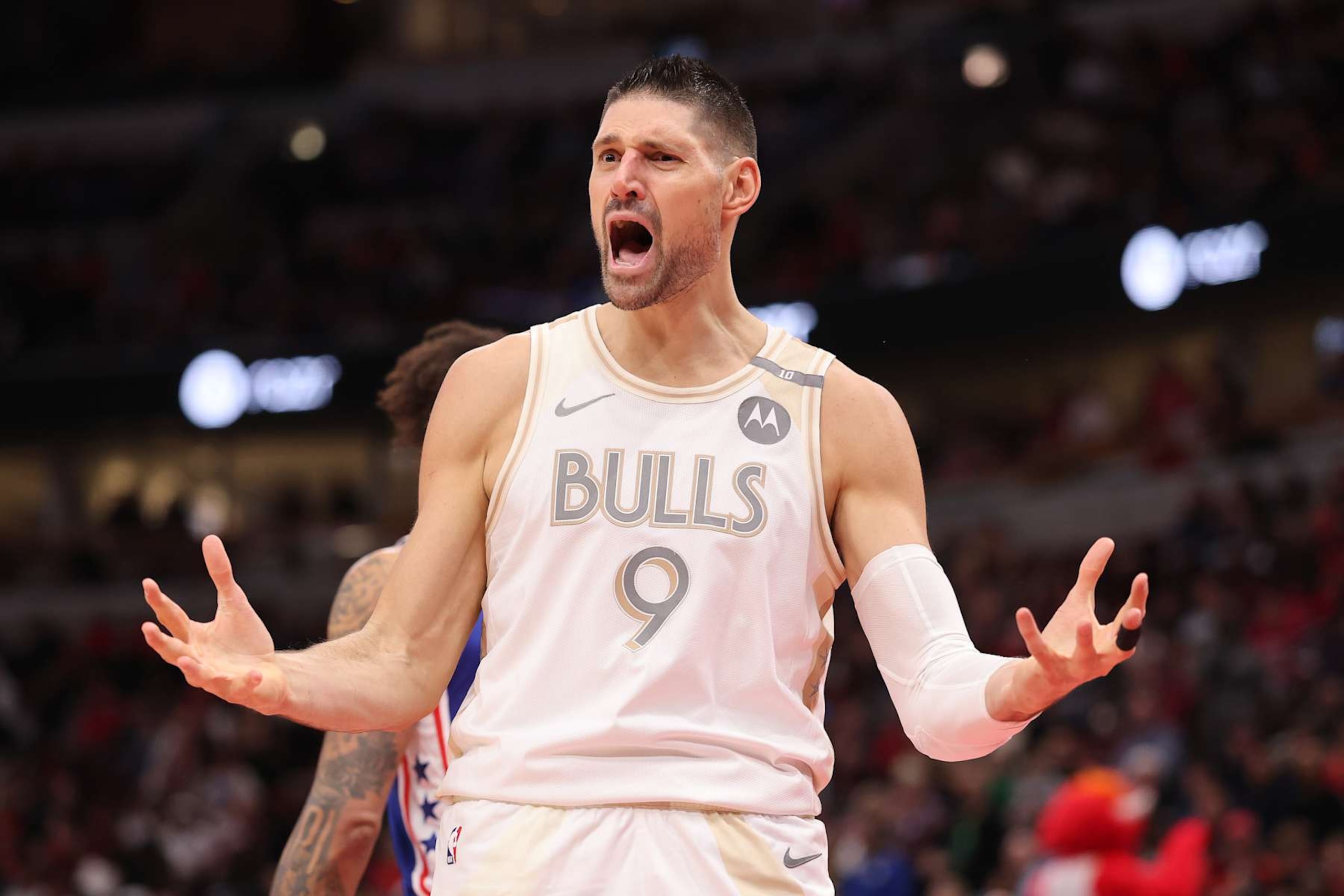 CHICAGO, ILLINOIS - JANUARY 25: Nikola Vucevic #9 of the Chicago Bulls reacts against the Philadelphia 76ers during the first half at the United Center on January 25, 2025 in Chicago, Illinois. NOTE TO USER: User expressly acknowledges and agrees that, by downloading and or using this photograph, User is consenting to the terms and conditions of the Getty Images License Agreement.  (Photo by Michael Reaves/Getty Images)