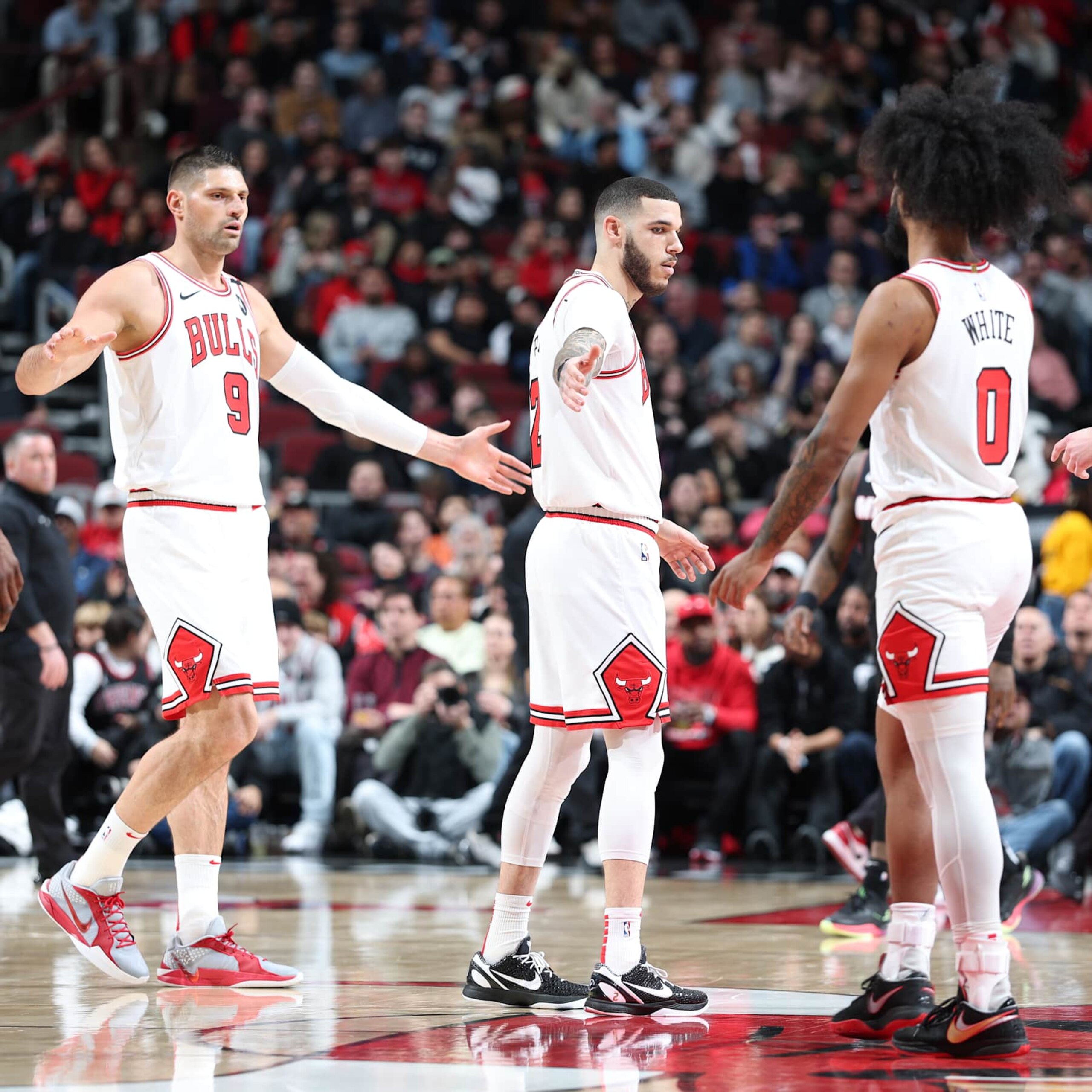 CHICAGO, IL - FEBRUARY 4: Nikola Vucevic #9, Lonzo Ball #2 and Coby White #0 of the Chicago Bulls look on during the game against the Miami Heat on February 4 2025 at United Center in Chicago, Illinois. NOTE TO USER: User expressly acknowledges and agrees that, by downloading and or using this photograph, User is consenting to the terms and conditions of the Getty Images License Agreement. Mandatory Copyright Notice: Copyright 2025 NBAE (Photo by Jeff Haynes/NBAE via Getty Images) CHICAGO, IL - FEBRUARY 4: Nikola Vucevic #9, Lonzo Ball #2 and Coby White #0 of the Chicago Bulls look on during the game against the Miami Heat on February 4 2025 at United Center in Chicago, Illinois. NOTE TO USER: User expressly acknowledges and agrees that, by downloading and or using this photograph, User is consenting to the terms and conditions of the Getty Images License Agreement. Mandatory Copyright Notice: Copyright 2025 NBAE (Photo by Jeff Haynes/NBAE via Getty Images)