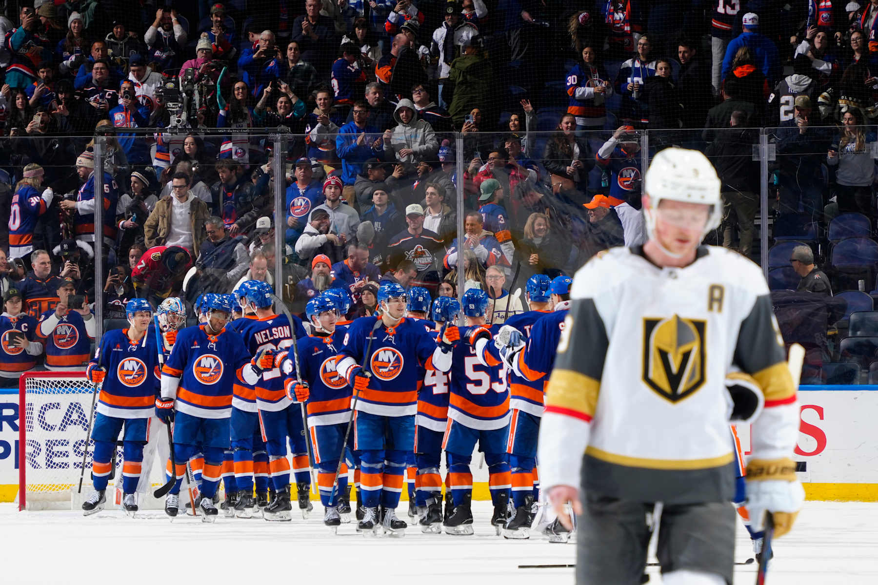 ELMONT, NEW YORK - FEBRUARY 04:  Alex Pietrangelo #7 of the Vegas Golden Knights reacts as the New York Islanders celebrate their win at UBS Arena on February 04, 2025 in Elmont, New York. (Photo by Mike Stobe/NHLI via Getty Images)