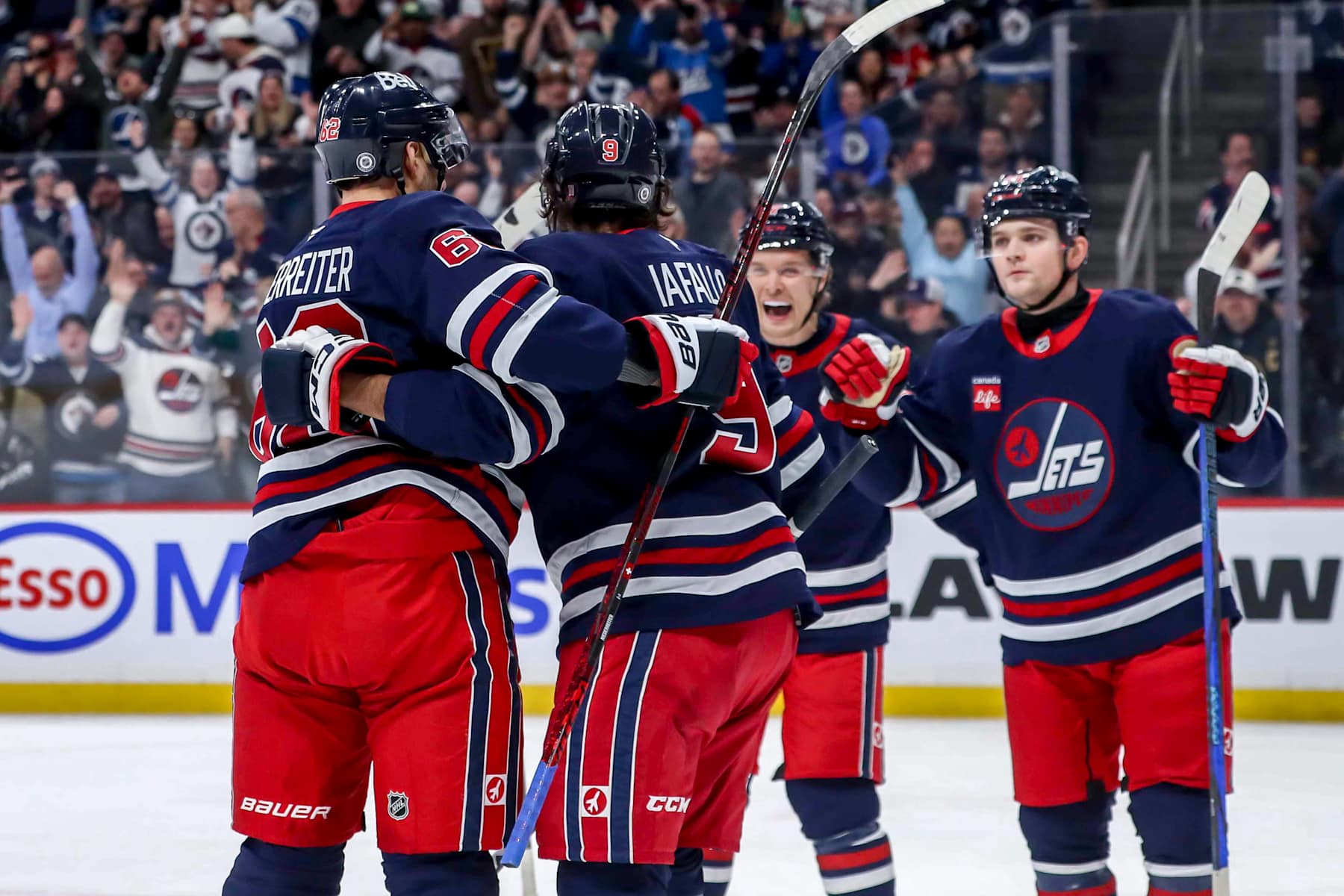 WINNIPEG, CANADA - FEBRUARY 4: Nino Niederreiter #62, Alex Iafallo #9, Vladislav Namestnikov #7 and Cole Perfetti #91 of the Winnipeg Jets celebrate a first period goal against the Carolina Hurricanes of the Winnipeg Jets celebrate a first period goal against the Carolina Hurricanes at the Canada Life Centre on February 4, 2025 in Winnipeg, Manitoba, Canada. (Photo by Darcy Finley/NHLI via Getty Images)