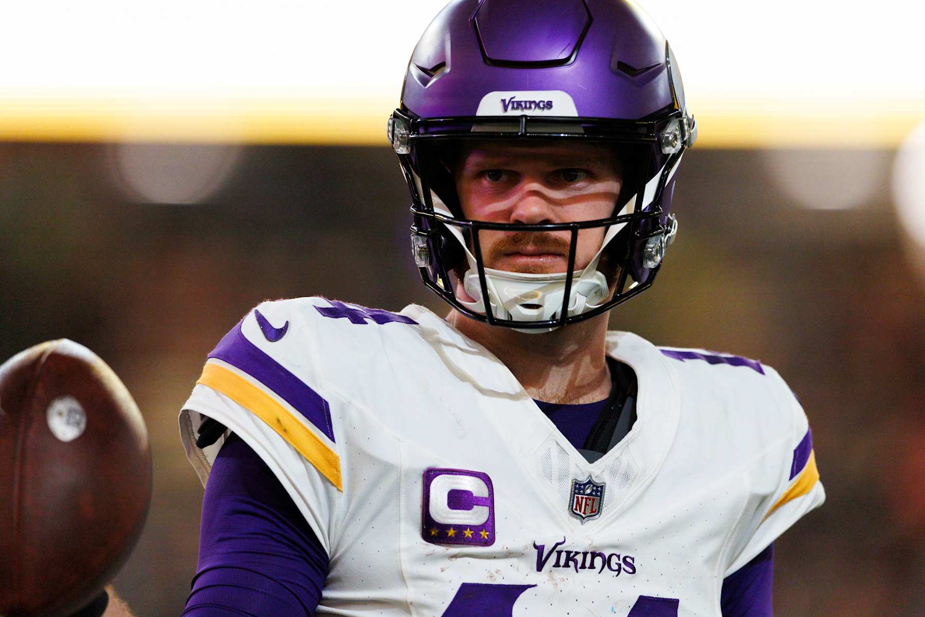 GLENDALE, ARIZONA - JANUARY 13: Sam Darnold #14 of the Minnesota Vikings on the sideline during the second half of the NFC Wild Card Playoff game against the Los Angeles Rams at State Farm Stadium on January 13, 2025 in Glendale, Arizona. (Photo by Ric Tapia/Getty Images)