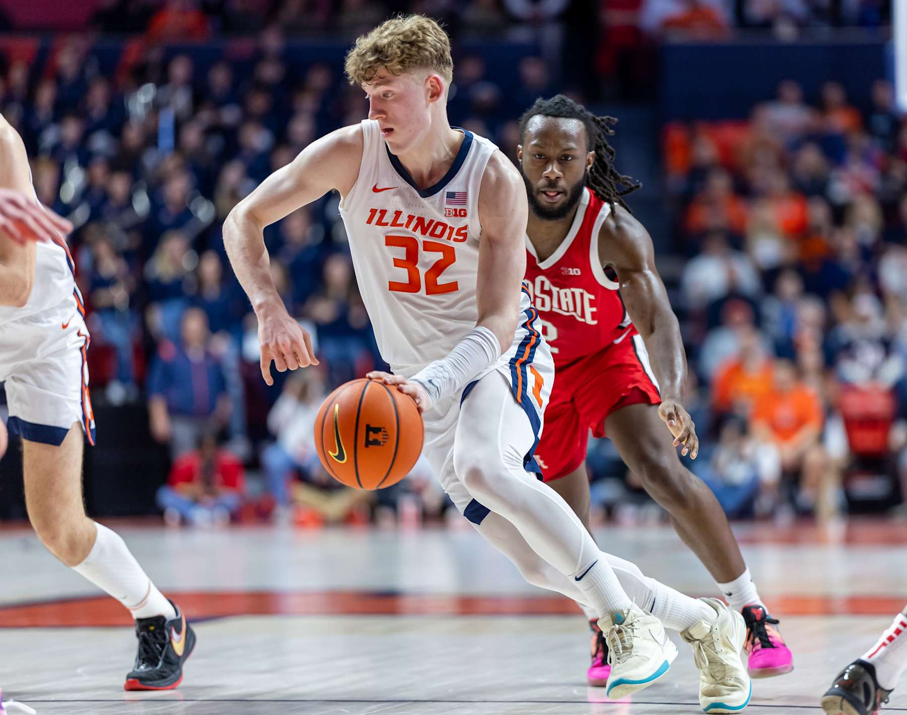 CHAMPAIGN, ILLINOIS - FEBRUARY 2: Kasparas Jakucionis #32 of the Illinois Fighting Illini brings the ball up court during the game against the Ohio State Buckeyes at State Farm Center on February 2, 2025 in Champaign, Illinois.  (Photo by Michael Hickey/Getty Images)