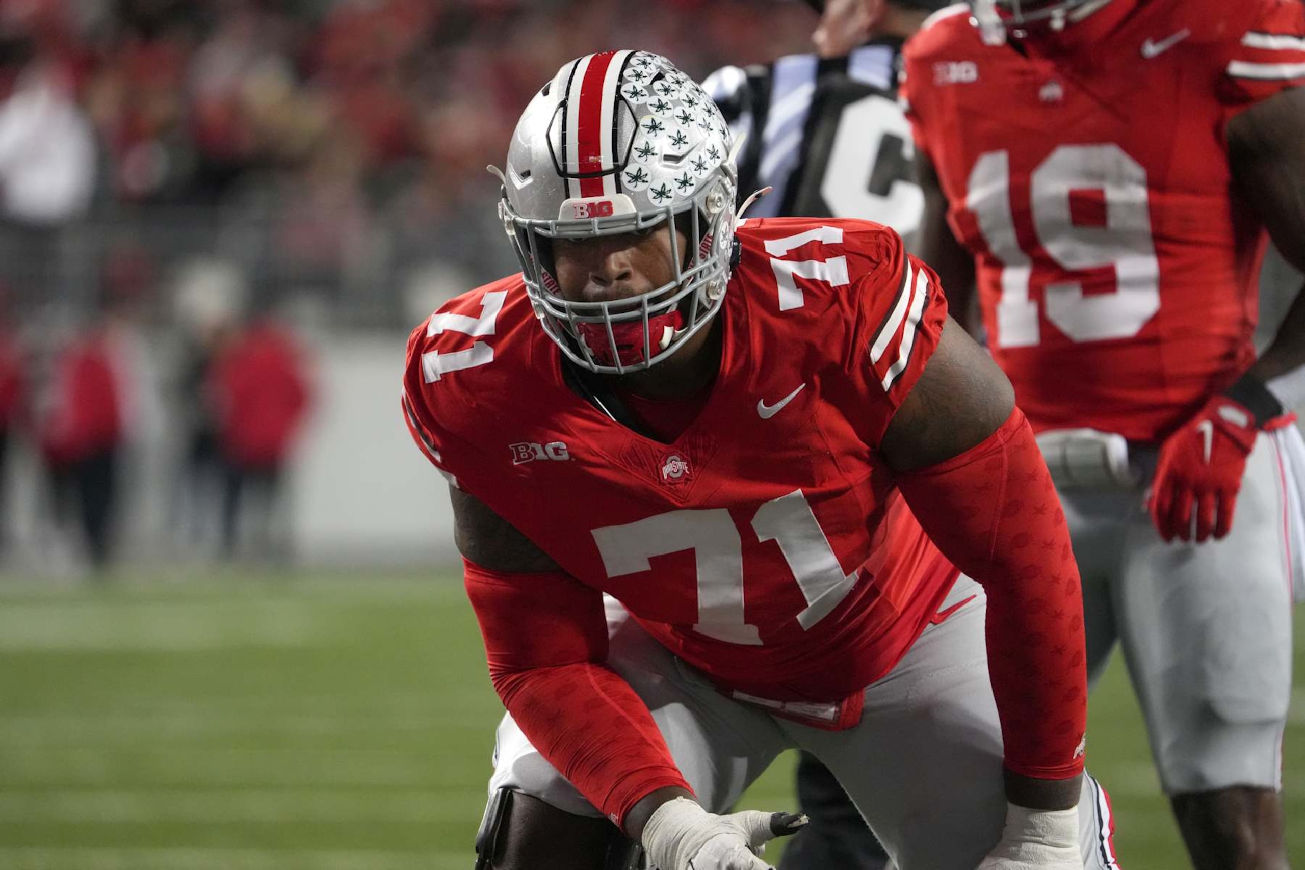 COLUMBUS, OHIO - NOVEMBER 18: Offensive lineman Josh Simmons #71 of the Ohio State Buckeyes lines up during the game against the Minnesota Golden Gophers at Ohio Stadium on November 18, 2023 in Columbus, Ohio. (Photo by Jason Mowry/Getty Images)