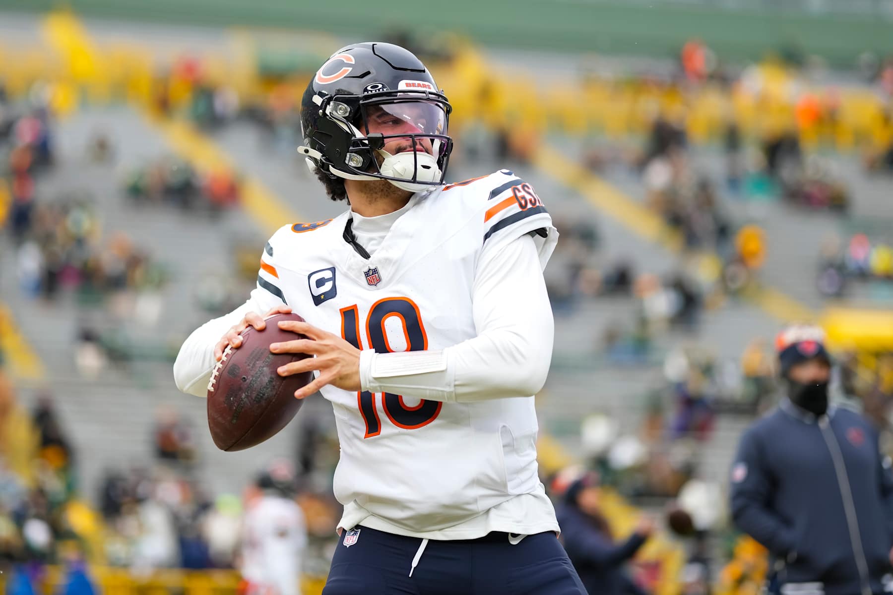 GREEN BAY, WISCONSIN - JANUARY 5: Quarterback Caleb Williams #18 of the Chicago Bears warms up prior to an NFL football game against the Green Bay Packers, at Lambeau Field on January 5, 2025 in Green Bay, Wisconsin. (Photo by Todd Rosenberg/Getty Images)