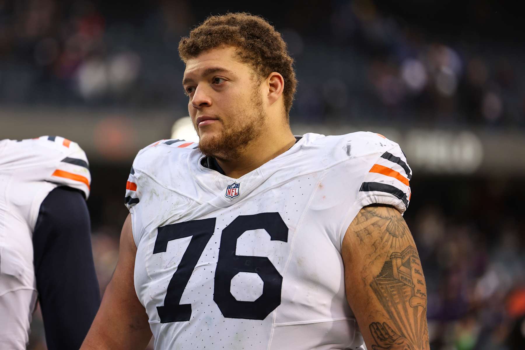 CHICAGO, ILLINOIS - NOVEMBER 24: Teven Jenkins #76 of the Chicago Bears looks on from the field after an NFL football game against the Minnesota Vikings at Soldier Field on November 24, 2024 in Chicago, Illinois. (Photo by Perry Knotts/Getty Images)