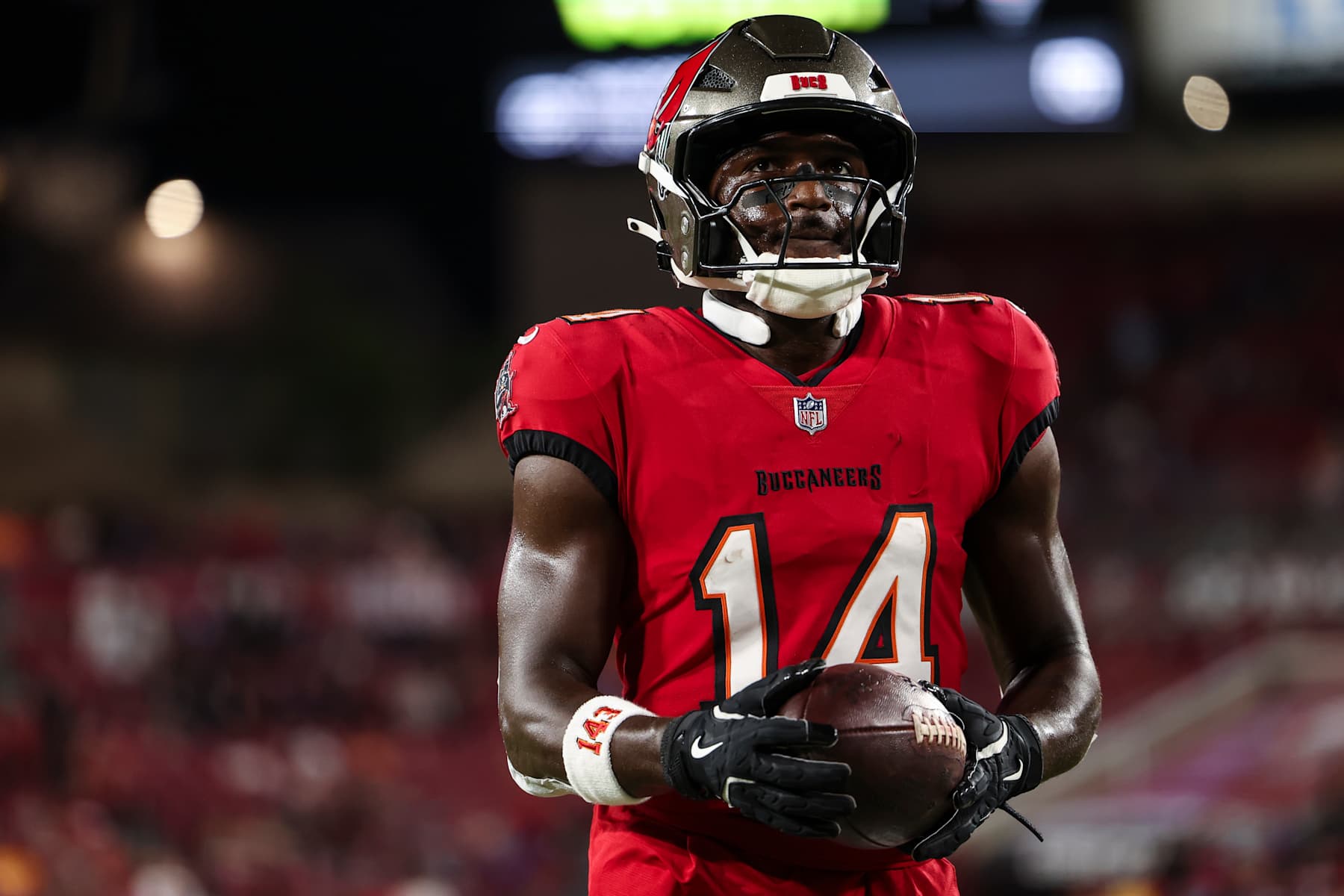 TAMPA, FLORIDA - OCTOBER 21: Chris Godwin #14 of the Tampa Bay Buccaneers warms up prior to an NFL football game against the Baltimore Ravens at Raymond James Stadium on October 21, 2024 in Tampa, Florida. (Photo by Perry Knotts/Getty Images)