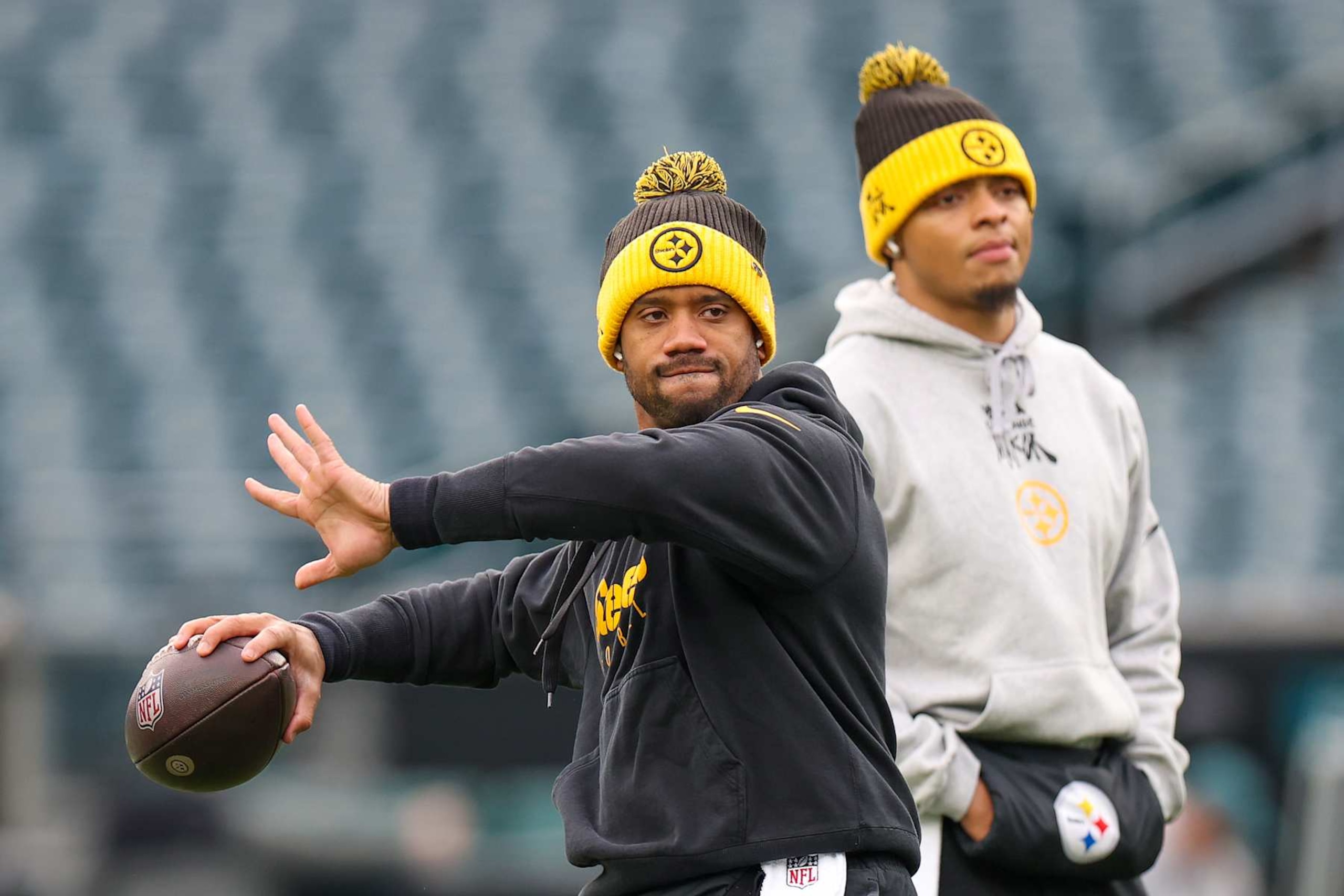PHILADELPHIA, PENNSYLVANIA - DECEMBER 15: Russell Wilson #3 and Justin Fields #2 of the Pittsburgh Steelers warm up before the game against the Philadelphia Eagles at Lincoln Financial Field on December 15, 2024 in Philadelphia, Pennsylvania. (Photo by Emilee Chinn/Getty Images) PHILADELPHIA, PENNSYLVANIA - DECEMBER 15: Russell Wilson #3 and Justin Fields #2 of the Pittsburgh Steelers warm up before the game against the Philadelphia Eagles at Lincoln Financial Field on December 15, 2024 in Philadelphia, Pennsylvania. (Photo by Emilee Chinn/Getty Images)