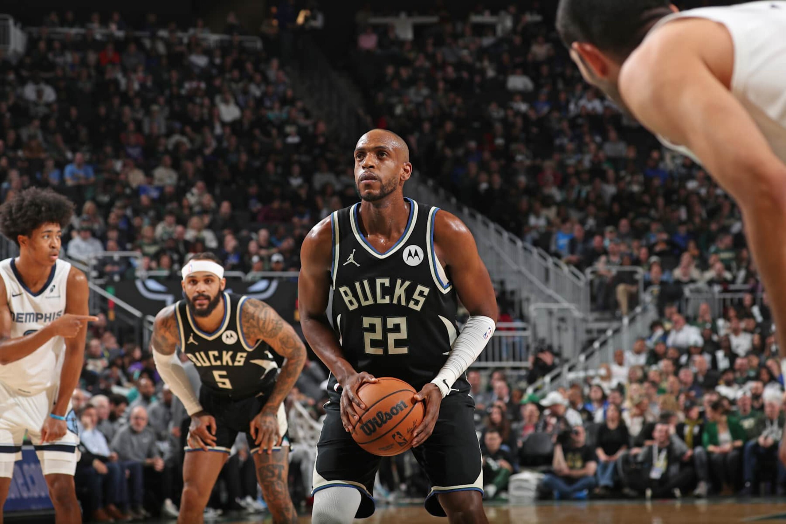 MILWAUKEE, WI - FEBRUARY 2: Khris Middleton #22 of the Milwaukee Bucks shoots a free throw during the game against the Memphis Grizzlies on February 2, 2025 at Fiserv Forum Center in Milwaukee, Wisconsin. NOTE TO USER: User expressly acknowledges and agrees that, by downloading and or using this Photograph, user is consenting to the terms and conditions of the Getty Images License Agreement. Mandatory Copyright Notice: Copyright 2025 NBAE (Photo by Gary Dineen/NBAE via Getty Images). MILWAUKEE, WI - FEBRUARY 2: Khris Middleton #22 of the Milwaukee Bucks shoots a free throw during the game against the Memphis Grizzlies on February 2, 2025 at Fiserv Forum Center in Milwaukee, Wisconsin. NOTE TO USER: User expressly acknowledges and agrees that, by downloading and or using this Photograph, user is consenting to the terms and conditions of the Getty Images License Agreement. Mandatory Copyright Notice: Copyright 2025 NBAE (Photo by Gary Dineen/NBAE via Getty Images).