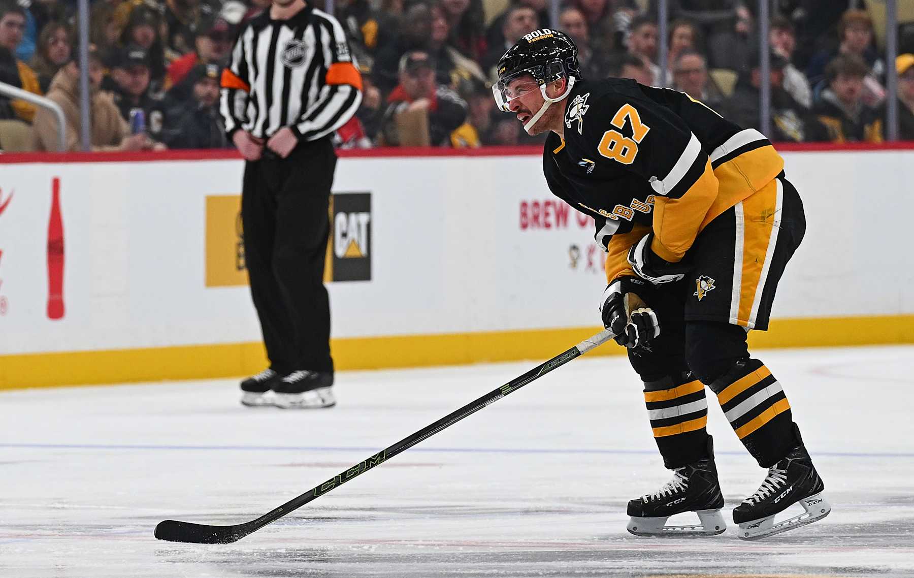 PITTSBURGH, PENNSYLVANIA - FEBRUARY 4: Sidney Crosby #87 of the Pittsburgh Penguins skates off the ice with an apparent injury in the third period against the New Jersey Devils at PPG PAINTS Arena on February 4, 2025 in Pittsburgh, Pennsylvania. (Photo by Justin Berl/Getty Images)