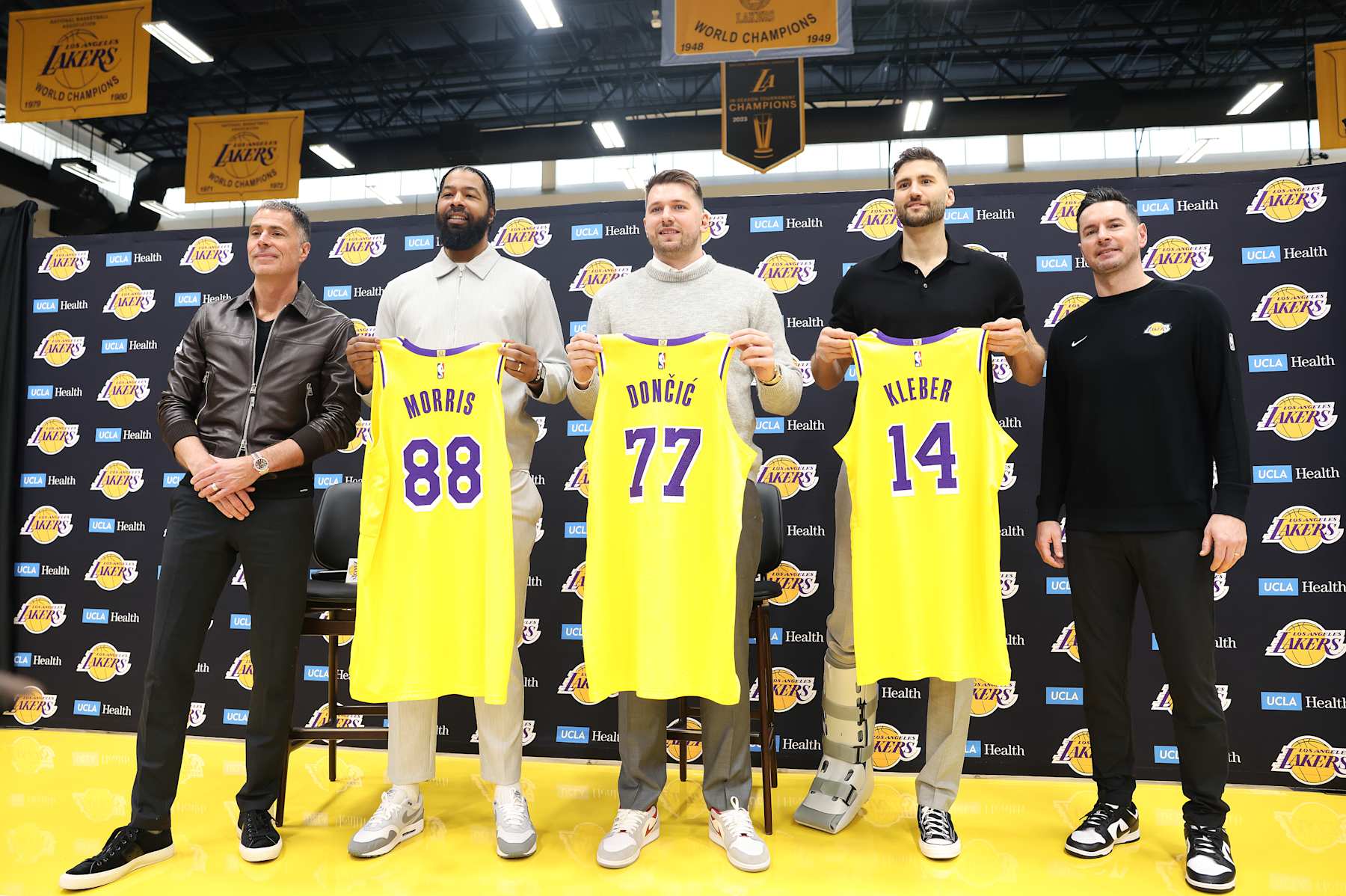 EL SEGUNDO, CA, FEBRUARY 4, 2025: Lakers general manager Rob Pelinka, Markeiff Morris, Luka Doncic, Maxi Kleber, and head coach JJ Redick, from left, at the Lakers training facility in El Segundo on Tuesday, February 4, 2025. (Christina House / Los Angeles Times via Getty Images)