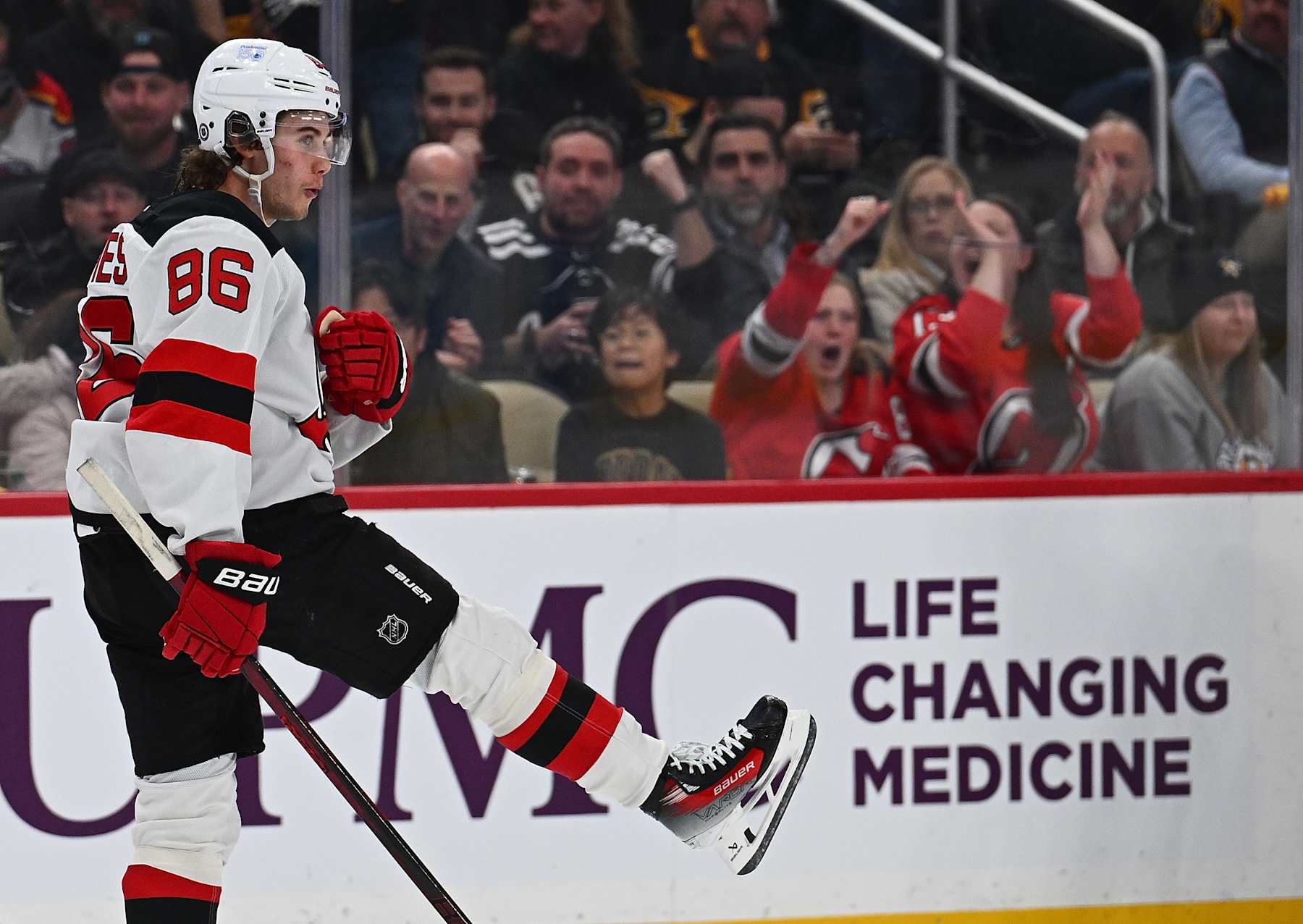 PITTSBURGH, PENNSYLVANIA - FEBRUARY 4: Jack Hughes #86 of the New Jersey Devils reacts after scoring a goal in the second period during the game against the Pittsburgh Penguins at PPG PAINTS Arena on February 4, 2025 in Pittsburgh, Pennsylvania. (Photo by Justin Berl/Getty Images)