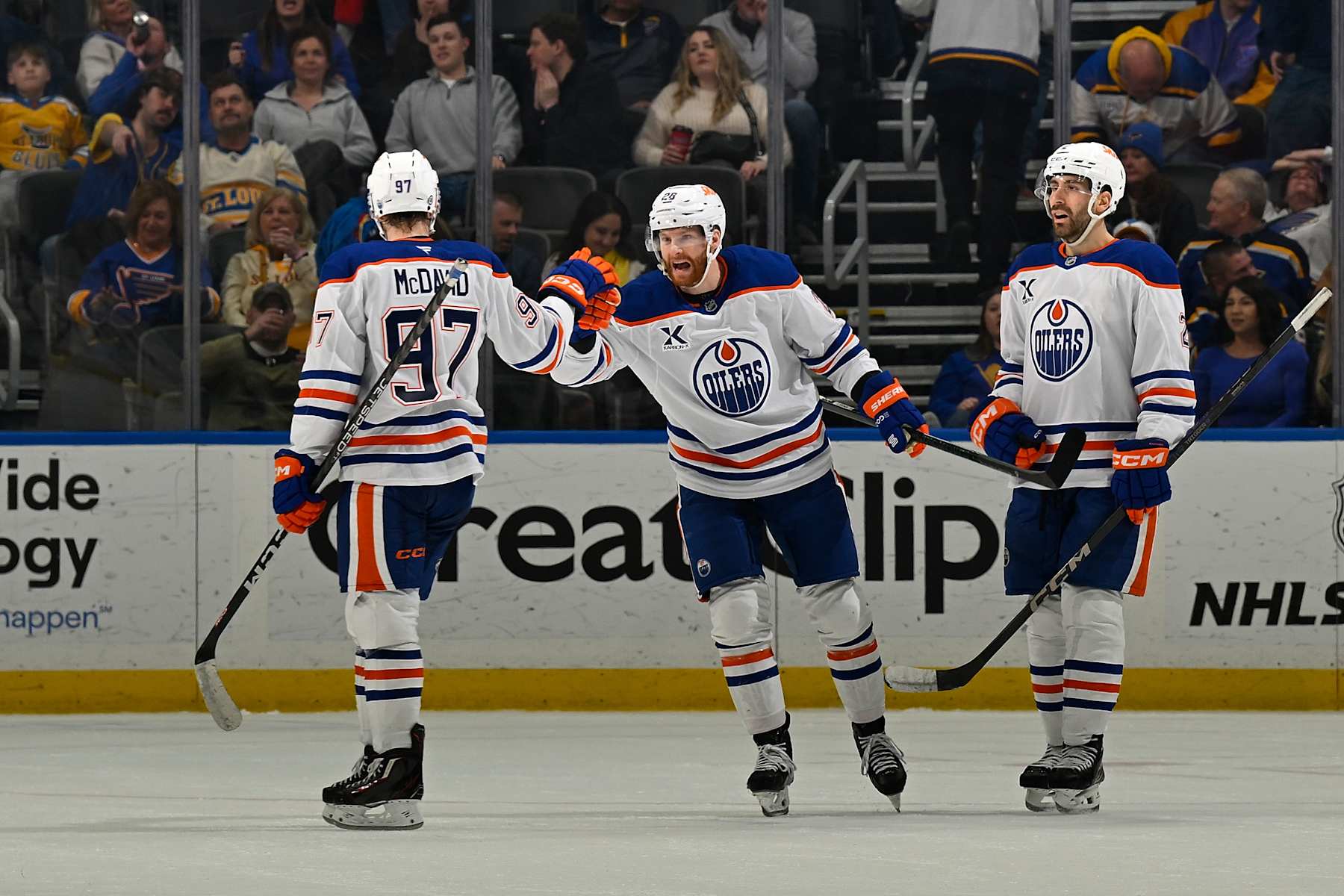 ST. LOUIS, MO - FEBRUARY 4: Connor Brown #28 of the Edmonton Oilers is congratulated after scoring the game winning goal against the St. Louis Blues on February 4, 2025 at the Enterprise Center in St. Louis, Missouri. (Photo by Scott Rovak/NHLI via Getty Images)