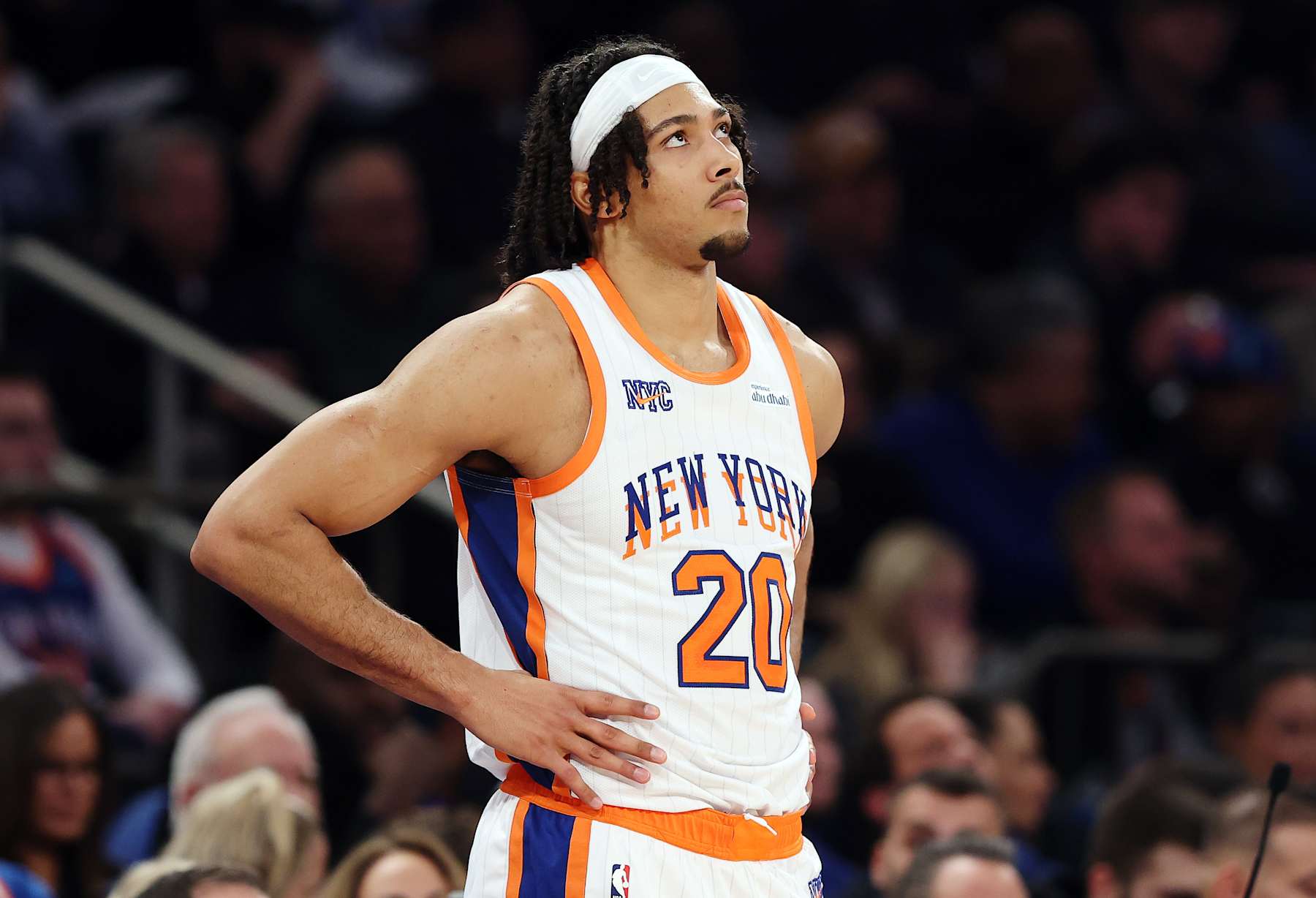 NEW YORK, NEW YORK - JANUARY 17: Jericho Sims #20 of the New York Knicks looks on during the first half against the Minnesota Timberwolves at Madison Square Garden on January 17, 2025 in New York City. NOTE TO USER: User expressly acknowledges and agrees that, by downloading and or using this photograph, User is consenting to the terms and conditions of the Getty Images License Agreement. (Photo by Sarah Stier/Getty Images)
