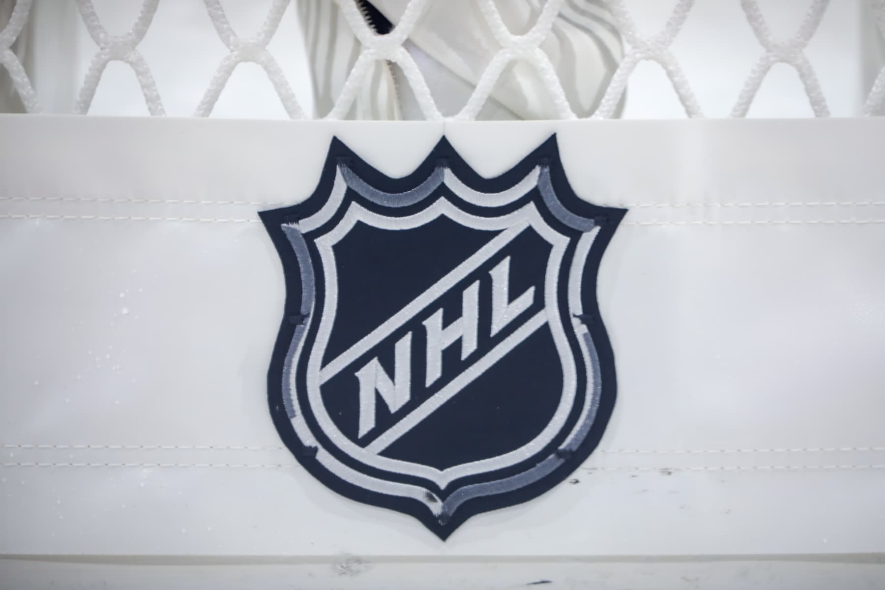 WINNIPEG, MB - FEBRUARY 13: A view of the NHL logo on the back of the net during the second intermission between the Ottawa Senators and the Winnipeg Jets at Bell MTS Place on February 13, 2021 in Winnipeg, Manitoba. (Photo by Jonathan Kozub/NHLI via Getty Images) WINNIPEG, MB - FEBRUARY 13: A view of the NHL logo on the back of the net during the second intermission between the Ottawa Senators and the Winnipeg Jets at Bell MTS Place on February 13, 2021 in Winnipeg, Manitoba. (Photo by Jonathan Kozub/NHLI via Getty Images)