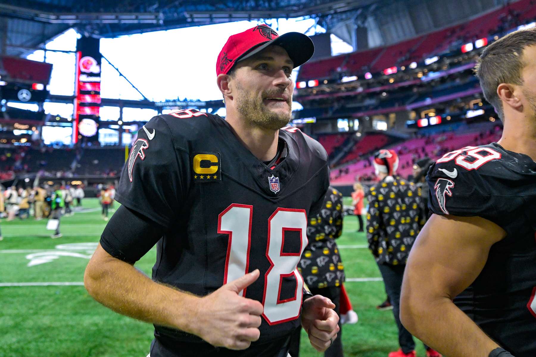 ATLANTA, GA  DECEMBER 22:  Atlanta quarterback Kirk Cousins (18) reacts following the conclusion of the NFL game between the New York Giants and the Atlanta Falcons on December 22nd, 2024 at Mercedes-Benz Stadium in Atlanta, GA.  (Photo by Rich von Biberstein/Icon Sportswire via Getty Images)
