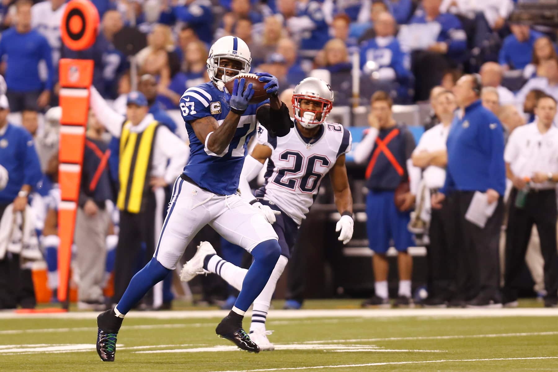 16 Nov 2014: Indianapolis Colts wide receiver Reggie Wayne (87) hauls in the pass during the football game between the New England Patriots vs Indianapolis Colts at Lucas Oil Stadium in Indianapolis, IN. (Photo by TMB/Icon Sportswire/Corbis/Icon Sportswire via Getty Images)