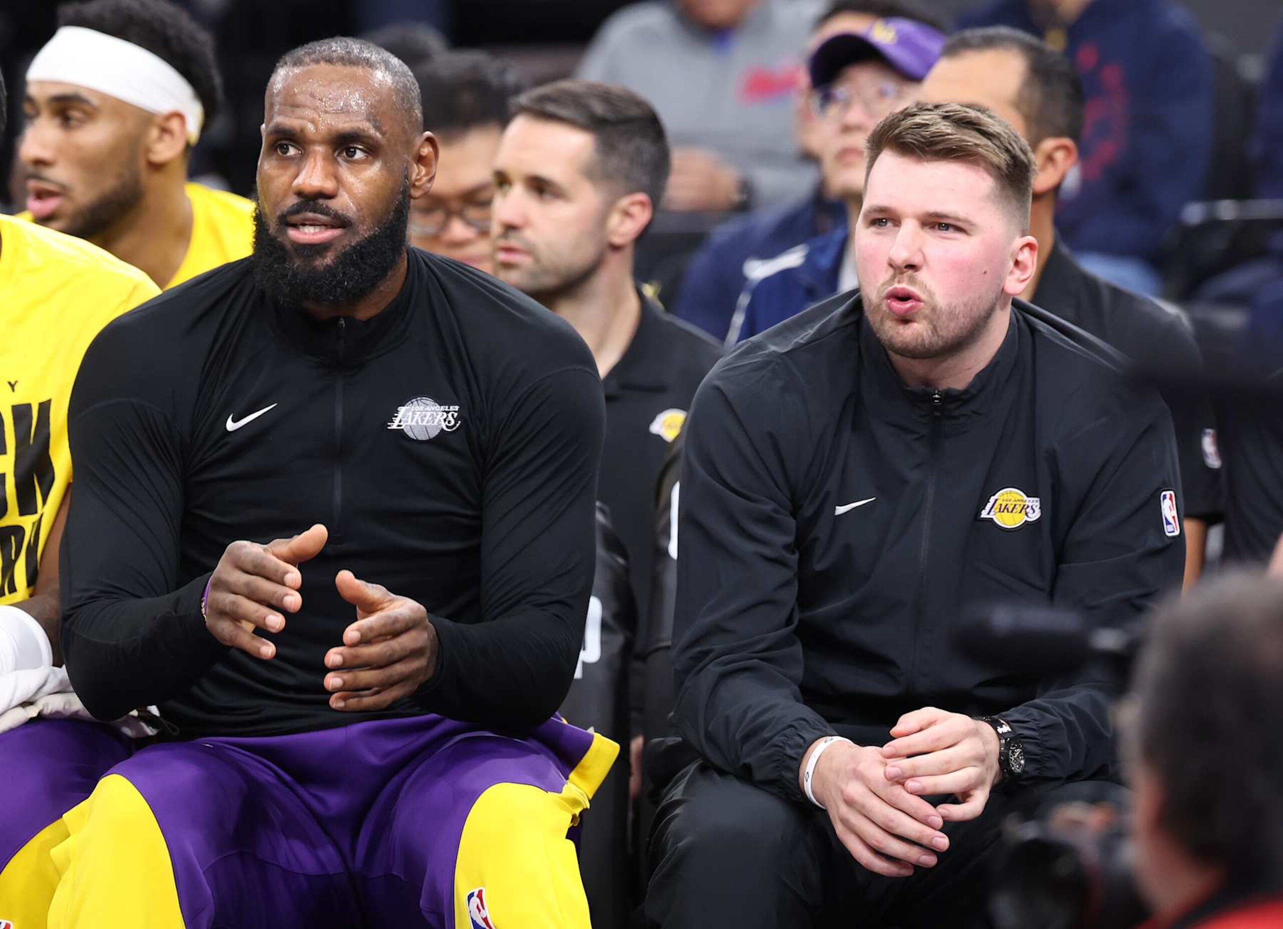 Inglewood, California February 4, 2025-Lakers LeBron James and Luka Doncic sit on the bench against the Clippers in the first quarter at the Intuit Dome Tuesday. (Wally Skalij/Los Angeles Times via Getty Images)