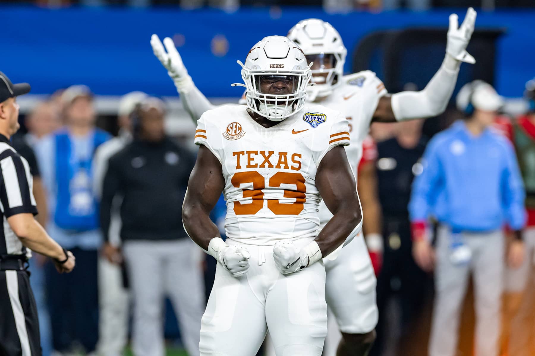 ARLINGTON, TX - JANUARY 10: Texas Longhorns linebacker David Gbenda (#33) celebrates after a defensive stop during the CFP Semifinal Cotton Bowl Classic football game between the Ohio State Buckeyes and Texas Longhorns on January 10, 2025 at AT&T Stadium in Arlington, TX.  (Photo by Matthew Visinsky/Icon Sportswire via Getty Images)