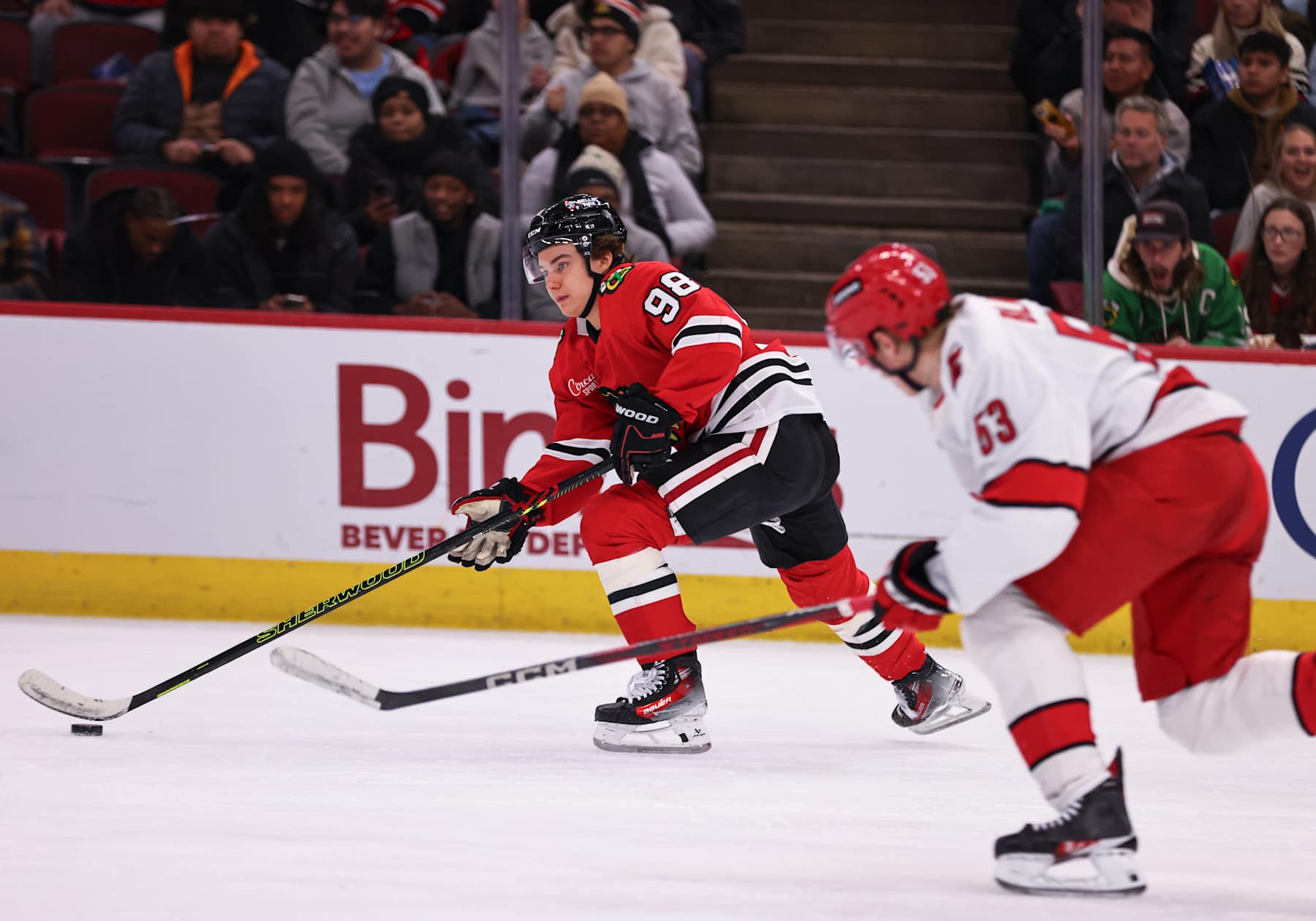 CHICAGO, IL - JANUARY 20: Ryan Donato #8 of the Chicago Blackhawks brings the puck up ice during the third period on January 20, 2025 at the United Center in Chicago, Illinois. (Photo by Melissa Tamez/Icon Sportswire via Getty Images)