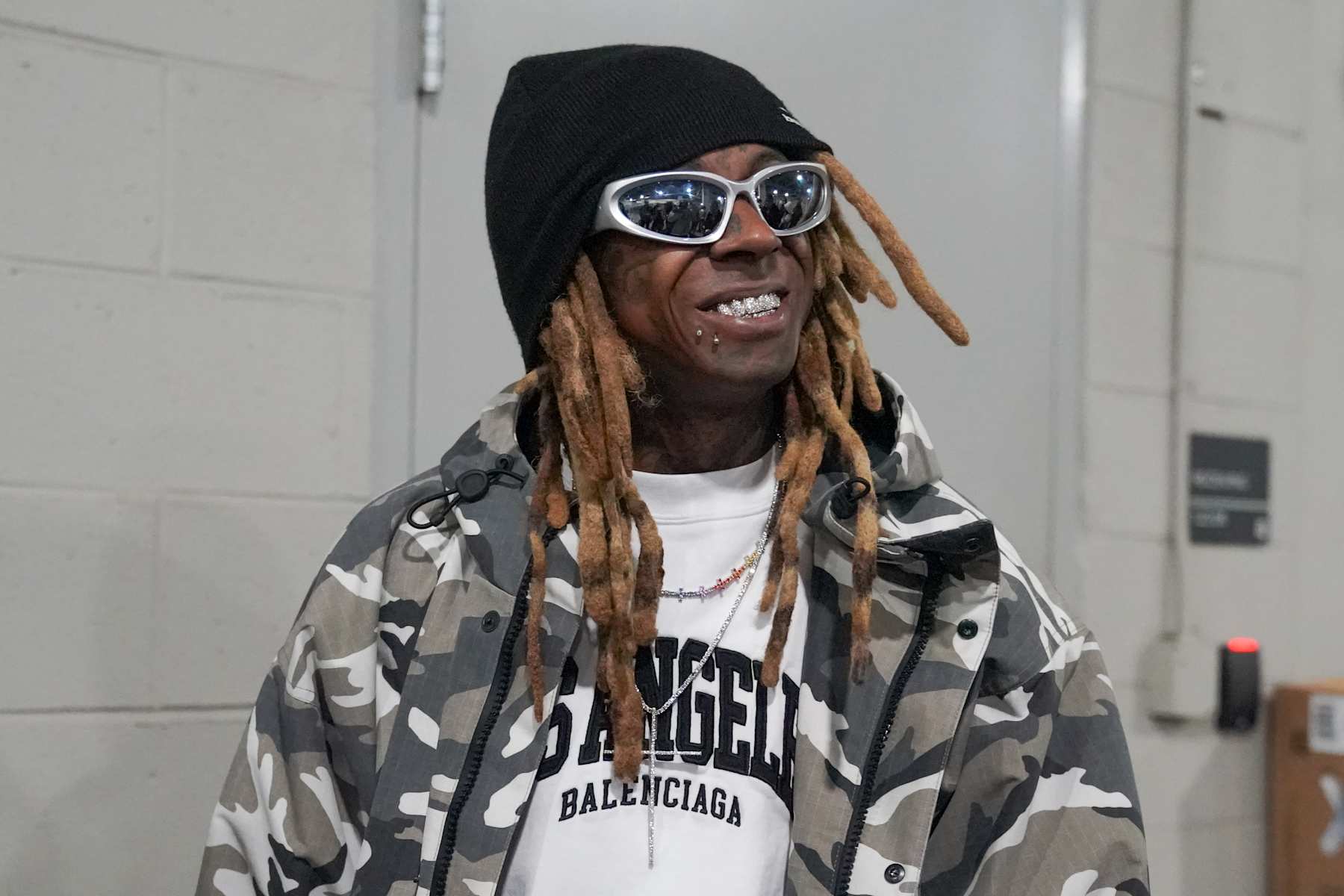 ATLANTA, GEORGIA - JANUARY 18: Lil Wayne arrives at the AT&T Playoff Playlist Live! concert at State Farm Arena on January 18, 2025 in Atlanta, Georgia. (Photo by Julia Beverly/Getty Images)