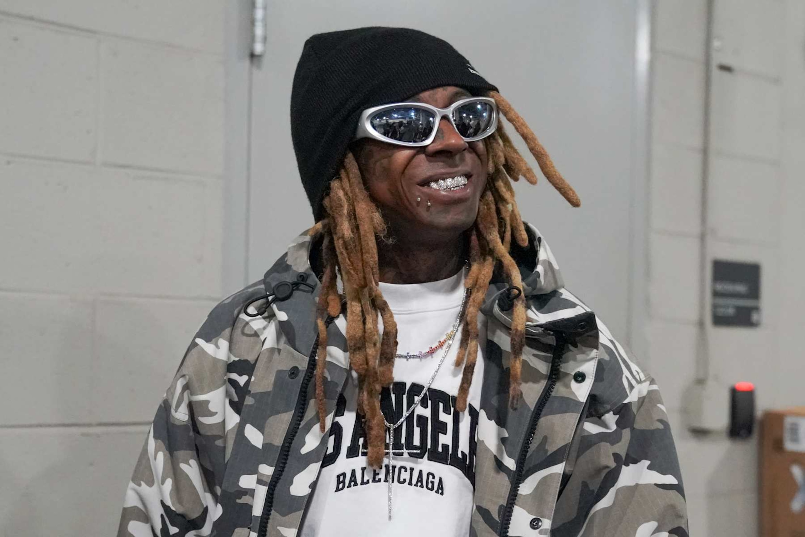 ATLANTA, GEORGIA - JANUARY 18: Lil Wayne arrives at the AT&T Playoff Playlist Live! concert at State Farm Arena on January 18, 2025 in Atlanta, Georgia. (Photo by Julia Beverly/Getty Images) ATLANTA, GEORGIA - JANUARY 18: Lil Wayne arrives at the AT&T Playoff Playlist Live! concert at State Farm Arena on January 18, 2025 in Atlanta, Georgia. (Photo by Julia Beverly/Getty Images)