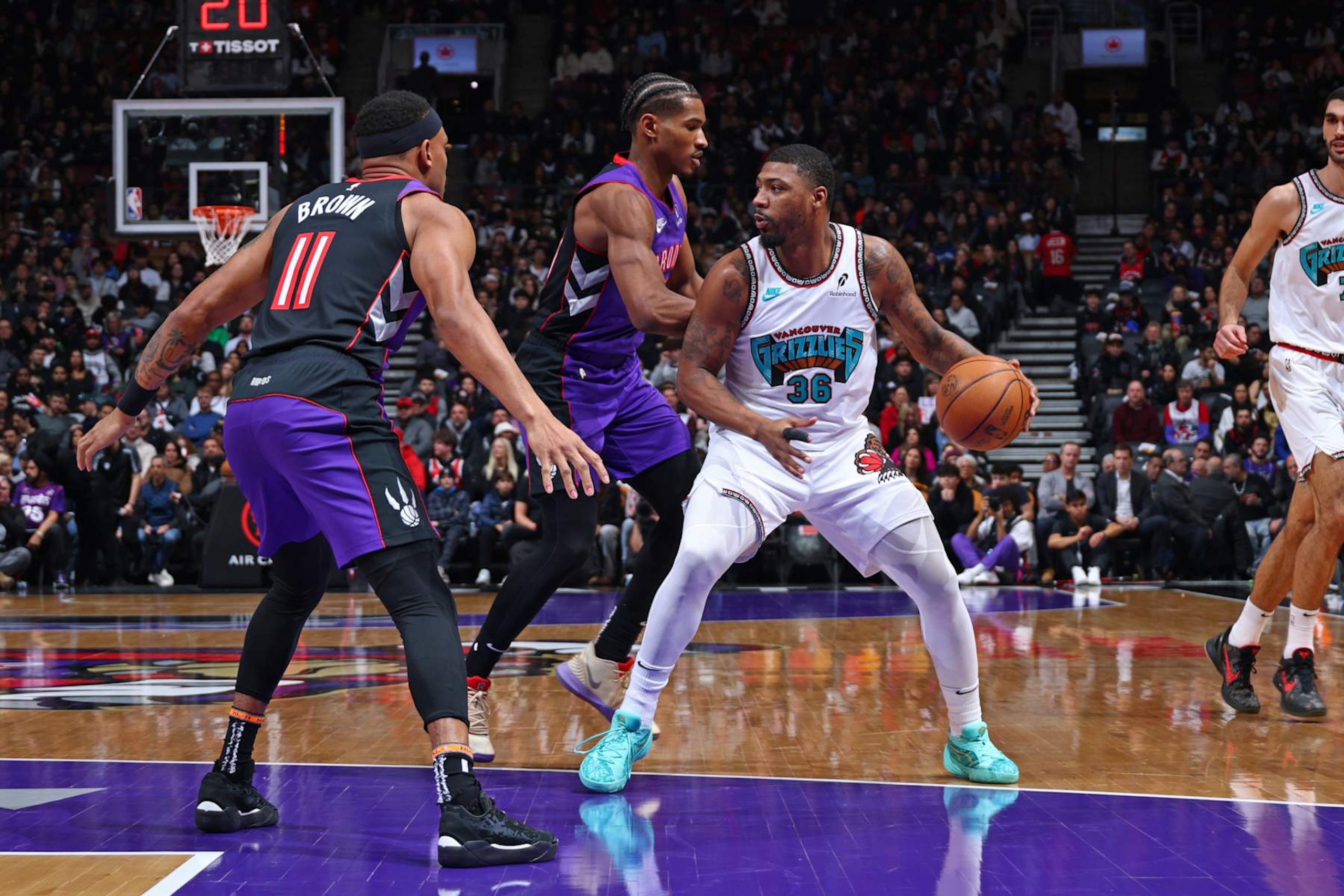 TORONTO, CANADA - FEBRUARY 5: Marcus Smart #36 of the Memphis Grizzlies handles the ball during the game against the Toronto Raptors on February 5, 2025 at the Scotiabank Arena in Toronto, Ontario, Canada.  NOTE TO USER: User expressly acknowledges and agrees that, by downloading and or using this Photograph, user is consenting to the terms and conditions of the Getty Images License Agreement.  Mandatory Copyright Notice: Copyright 2025 NBAE (Photo by Vaughn Ridley/NBAE via Getty Images)