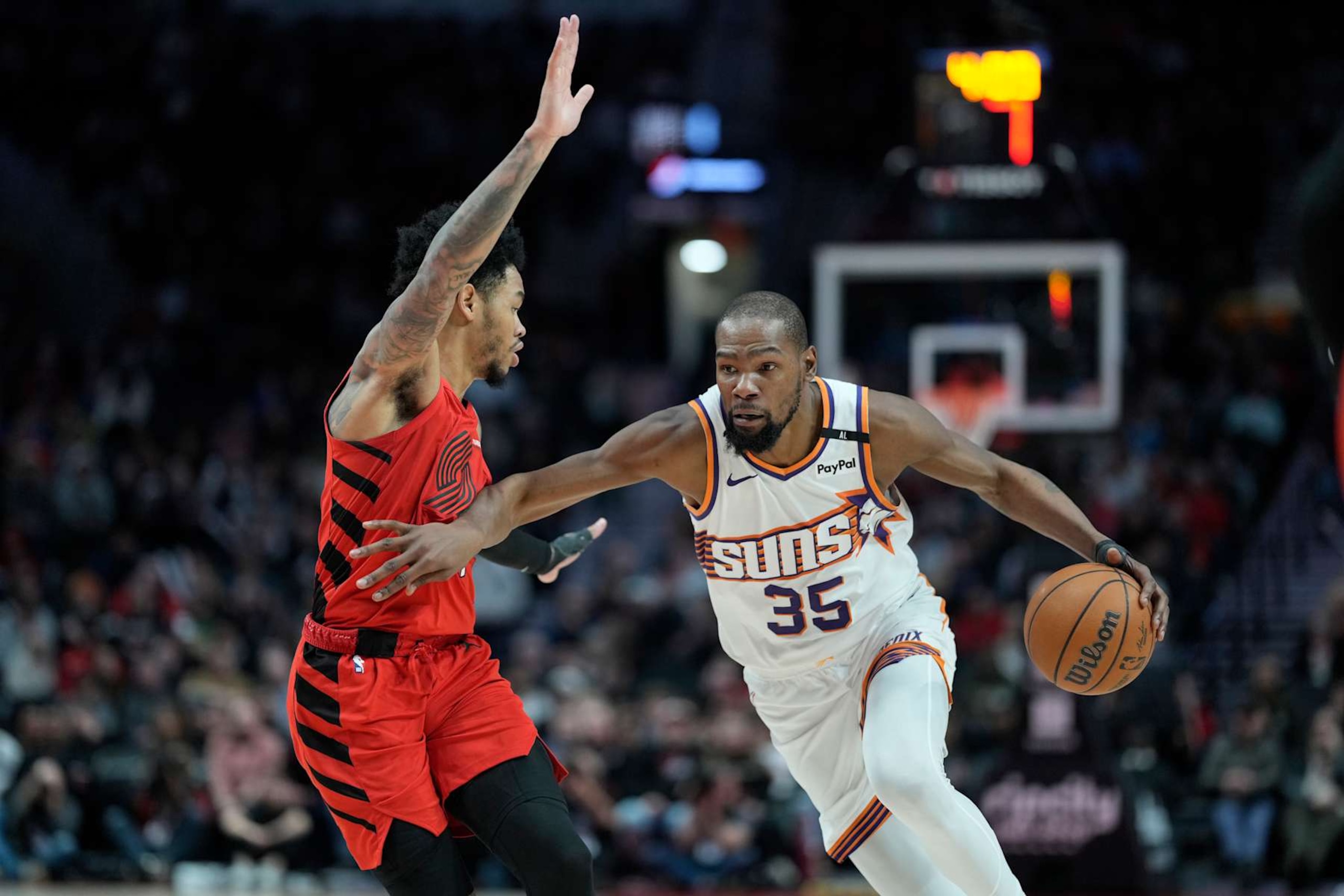 PORTLAND, OREGON - FEBRUARY 03: Kevin Durant #35 of the Phoenix Suns drives against Anfernee Simons #1 of the Portland Trail Blazers during overtime at Moda Center on February 03, 2025 in Portland, Oregon. NOTE TO USER: User expressly acknowledges and agrees that, by downloading and or using this photograph, User is consenting to the terms and conditions of the Getty Images License Agreement. (Photo by Soobum Im/Getty Images) PORTLAND, OREGON - FEBRUARY 03: Kevin Durant #35 of the Phoenix Suns drives against Anfernee Simons #1 of the Portland Trail Blazers during overtime at Moda Center on February 03, 2025 in Portland, Oregon. NOTE TO USER: User expressly acknowledges and agrees that, by downloading and or using this photograph, User is consenting to the terms and conditions of the Getty Images License Agreement. (Photo by Soobum Im/Getty Images)
