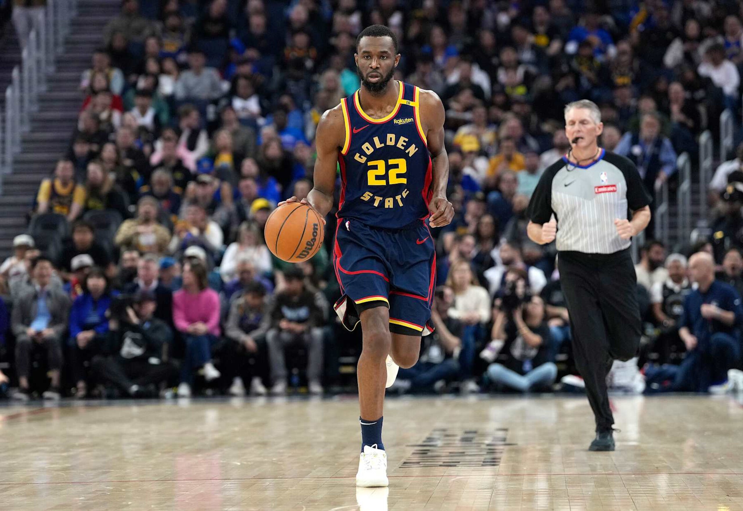 SAN FRANCISCO, CALIFORNIA - JANUARY 31: Andrew Wiggins #22 of the Golden State Warriors dribbles the ball up court against the Phoenix Suns during the first half of an NBA basketball game at Chase Center on January 31, 2025 in San Francisco, California. NOTE TO USER: User expressly acknowledges and agrees that, by downloading and or using this photograph, User is consenting to the terms and conditions of the Getty Images License Agreement. (Photo by Thearon W. Henderson/Getty Images) SAN FRANCISCO, CALIFORNIA - JANUARY 31: Andrew Wiggins #22 of the Golden State Warriors dribbles the ball up court against the Phoenix Suns during the first half of an NBA basketball game at Chase Center on January 31, 2025 in San Francisco, California. NOTE TO USER: User expressly acknowledges and agrees that, by downloading and or using this photograph, User is consenting to the terms and conditions of the Getty Images License Agreement. (Photo by Thearon W. Henderson/Getty Images)