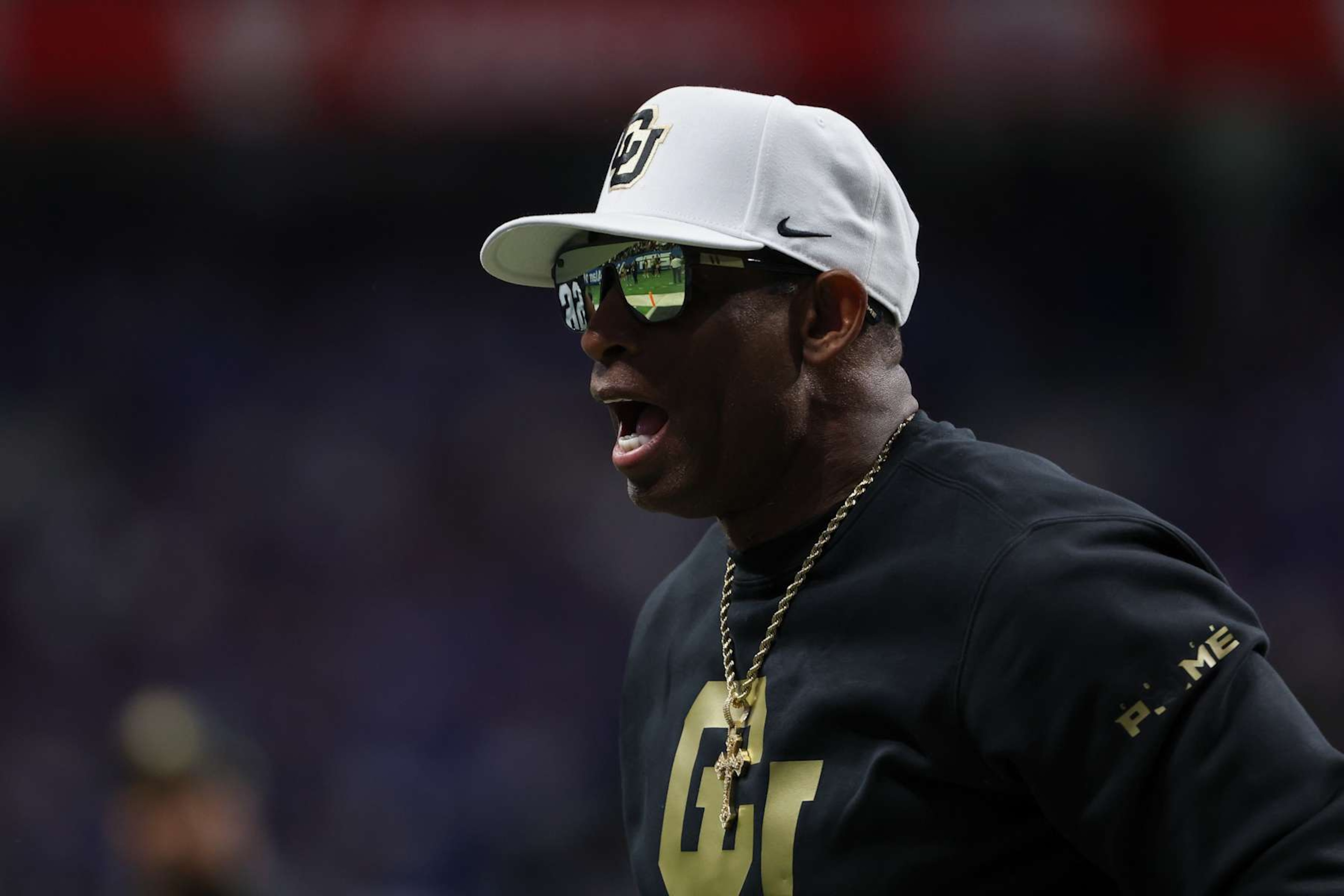 SAN ANTONIO, TX - DECEMBER 28: Colorado Buffaloes head coach Deion Sanders on the field before the football game between BYU Cougars and Colorado Buffalos on December 28, 2024, at the Alamodome in San Antonio, Texas. (Photo by David Buono/Icon Sportswire via Getty Images) SAN ANTONIO, TX - DECEMBER 28: Colorado Buffaloes head coach Deion Sanders on the field before the football game between BYU Cougars and Colorado Buffalos on December 28, 2024, at the Alamodome in San Antonio, Texas. (Photo by David Buono/Icon Sportswire via Getty Images)