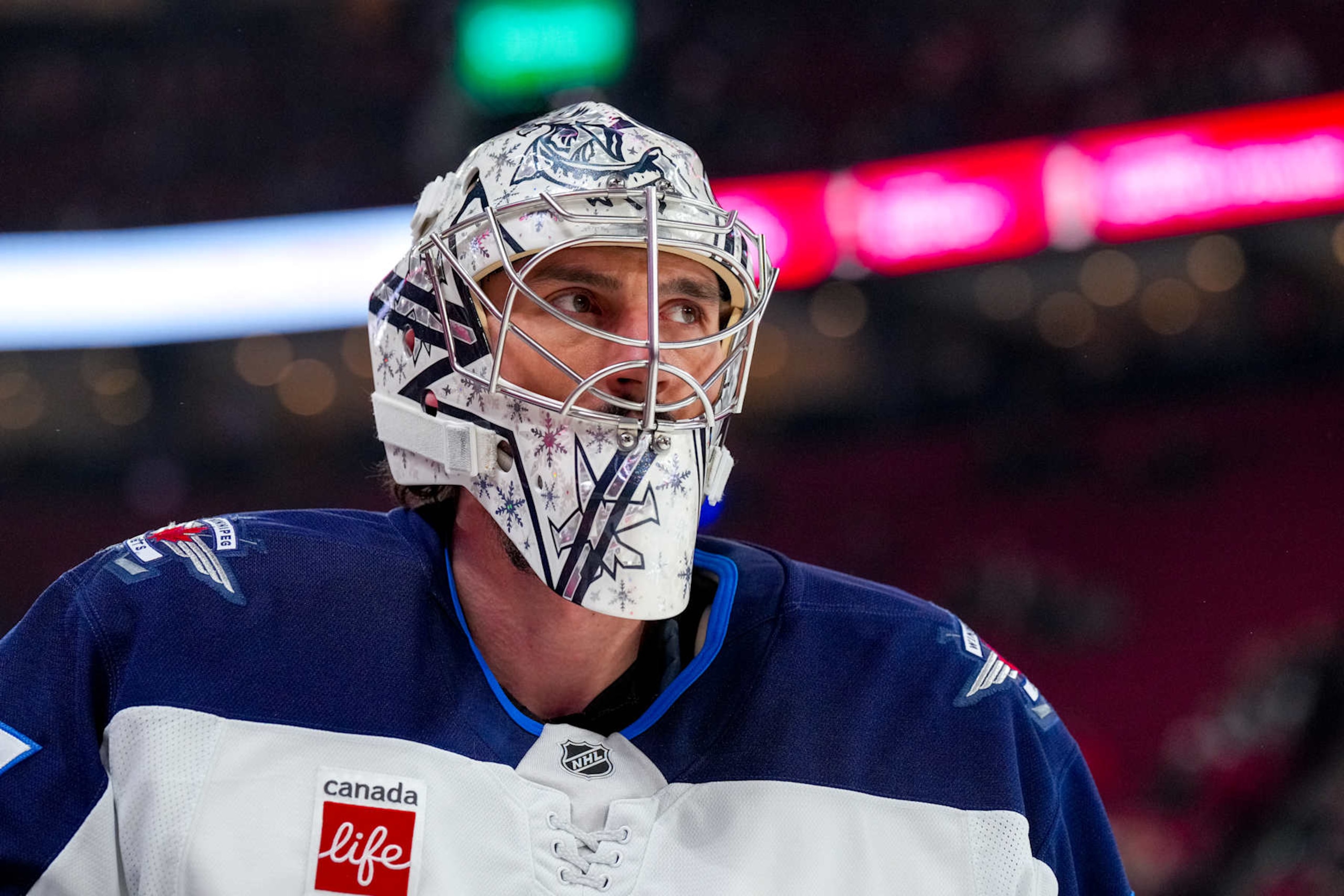 MONTREAL, QUEBEC - JANUARY 28: Connor Hellebuyck #37 of the Winnipeg Jets looks on before the game against the Montreal Canadiens at Bell Centre on January 28, 2025 in Montreal, Quebec. (Photo by Reuben Polansky-Shapiro/NHLI via Getty Images) MONTREAL, QUEBEC - JANUARY 28: Connor Hellebuyck #37 of the Winnipeg Jets looks on before the game against the Montreal Canadiens at Bell Centre on January 28, 2025 in Montreal, Quebec. (Photo by Reuben Polansky-Shapiro/NHLI via Getty Images)