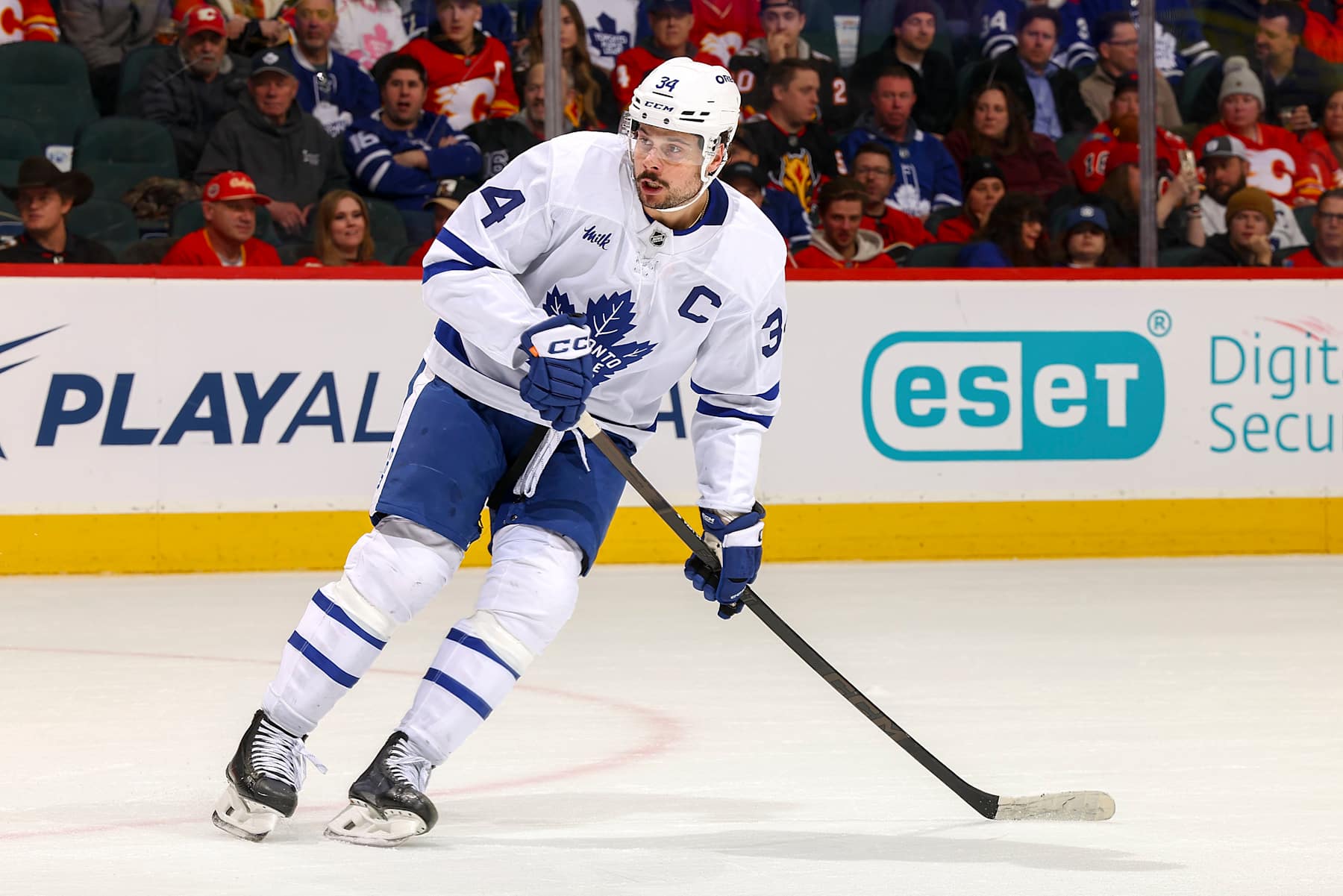 CALGARY, AB - FEBRUARY 4: Auston Matthews #34 of the Toronto Maple Leafs skates up ice against the Calgary Flames at Scotiabank Saddledome on February 4, 2025 in Calgary, Alberta, Canada. (Photo by Gerry Thomas/NHLI via Getty Images)