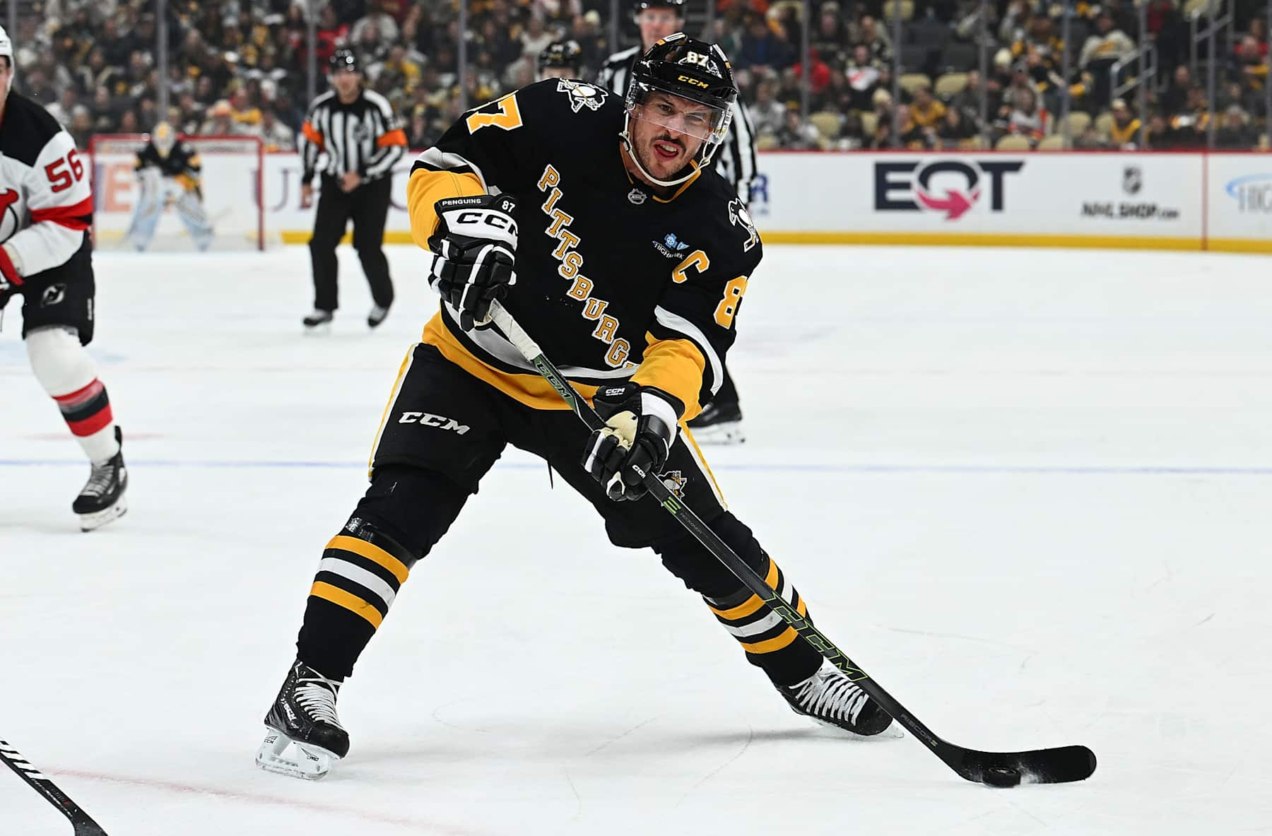 PITTSBURGH, PENNSYLVANIA - FEBRUARY 4: Sidney Crosby #87 of the Pittsburgh Penguins skates the puck in the first period against the New Jersey Devils at PPG PAINTS Arena on February 4, 2025 in Pittsburgh, Pennsylvania. (Photo by Justin Berl/Getty Images)