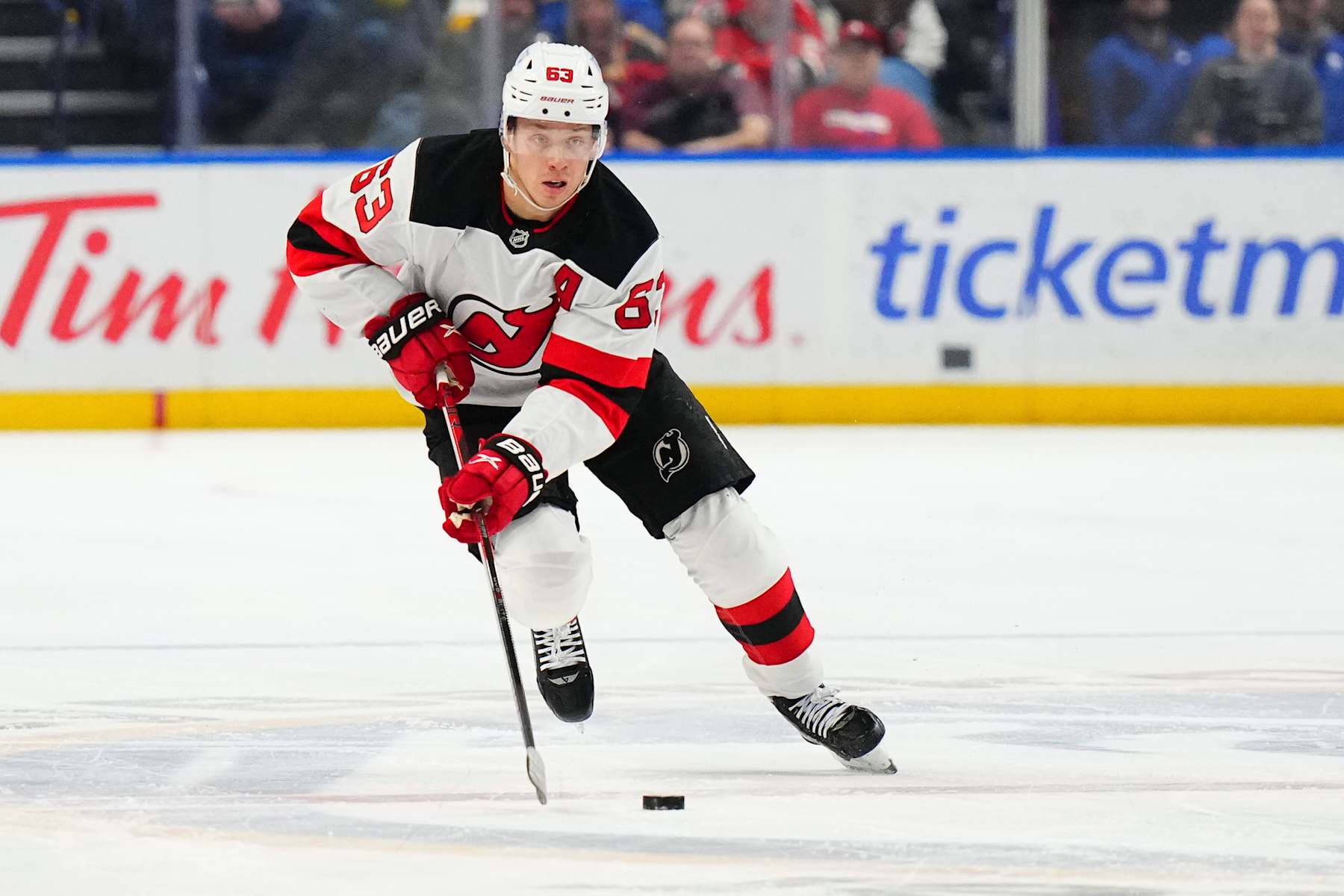 BUFFALO, NEW YORK - FEBRUARY 2: Jesper Bratt #63 of the New Jersey Devils skates against the Buffalo Sabres during the first period during the game on February 2, 2025 at KeyBank Center in Buffalo, New York. (Photo by Maddie Crooke/NHLI via Getty Images)