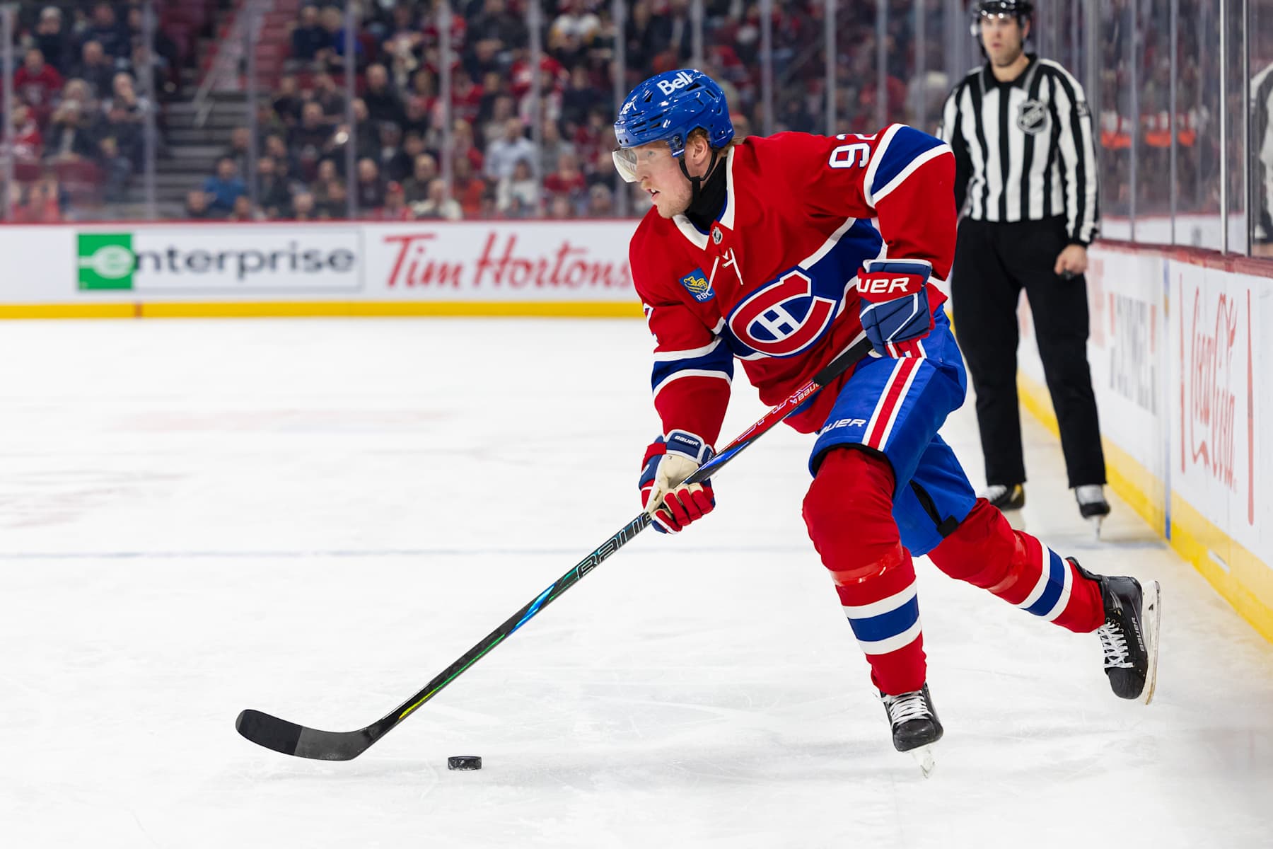 MONTREAL, CANADA - JANUARY 30: Patrik Laine #92 of the Montreal Canadiens skates with the puck against the Minnesota Wild during the third period at the Bell Centre on January 30, 2025 in Montreal, Quebec, Canada. (Photo by Vitor Munhoz/NHLI via Getty Images)