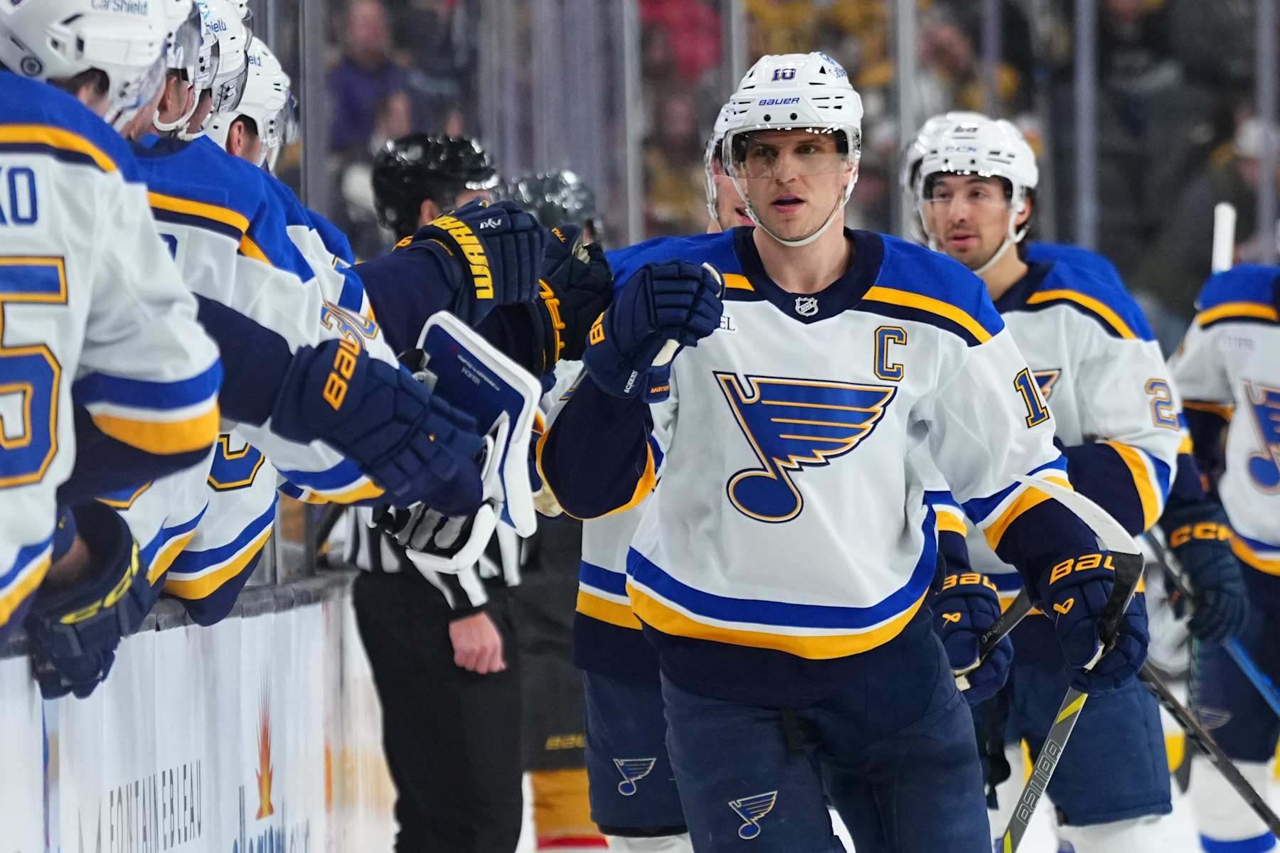 LAS VEGAS, NEVADA - JANUARY 20: Brayden Schenn #10 of the St. Louis Blues celebrates with teammates after a goal during the first period against the Vegas Golden Knights at T-Mobile Arena on January 20, 2025 in Las Vegas, Nevada. (Photo by Jeff Bottari/NHLI via Getty Images)