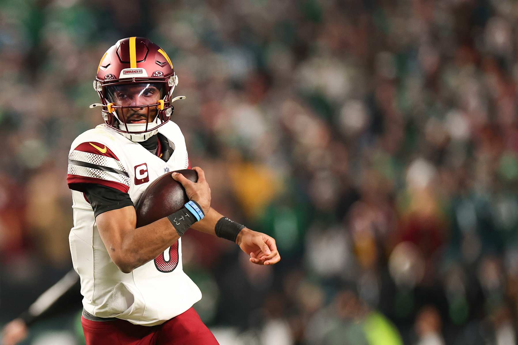 PHILADELPHIA, PENNSYLVANIA - JANUARY 26: Jayden Daniels #5 of the Washington Commanders runs with the football during the third quarter in the NFC Championship Game against the Philadelphia Eagles at Lincoln Financial Field on January 26, 2025 in Philadelphia, Pennsylvania. (Photo by Kathryn Riley/Getty Images)